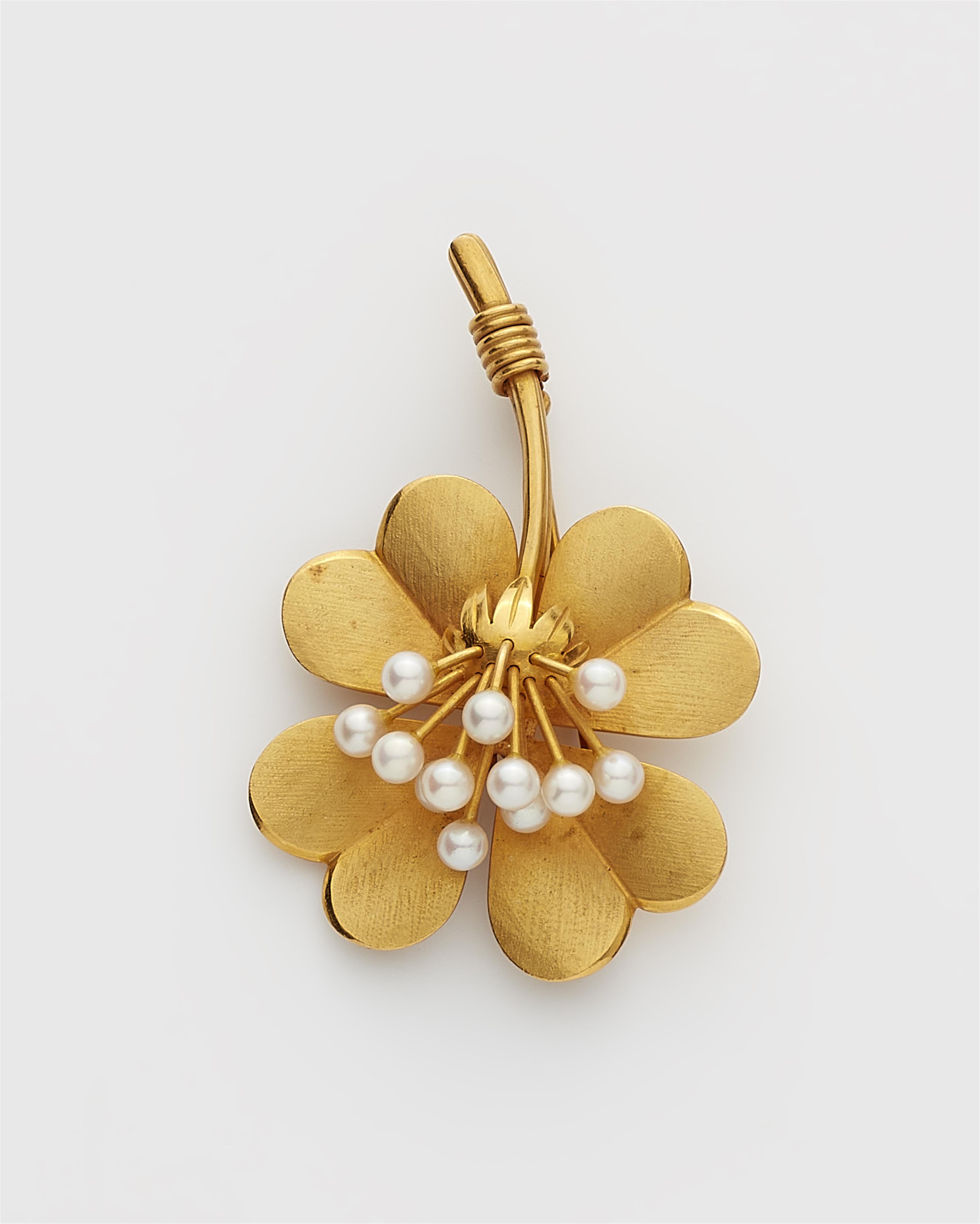 A German 18k gold and cultured pearl clover brooch. - image-1