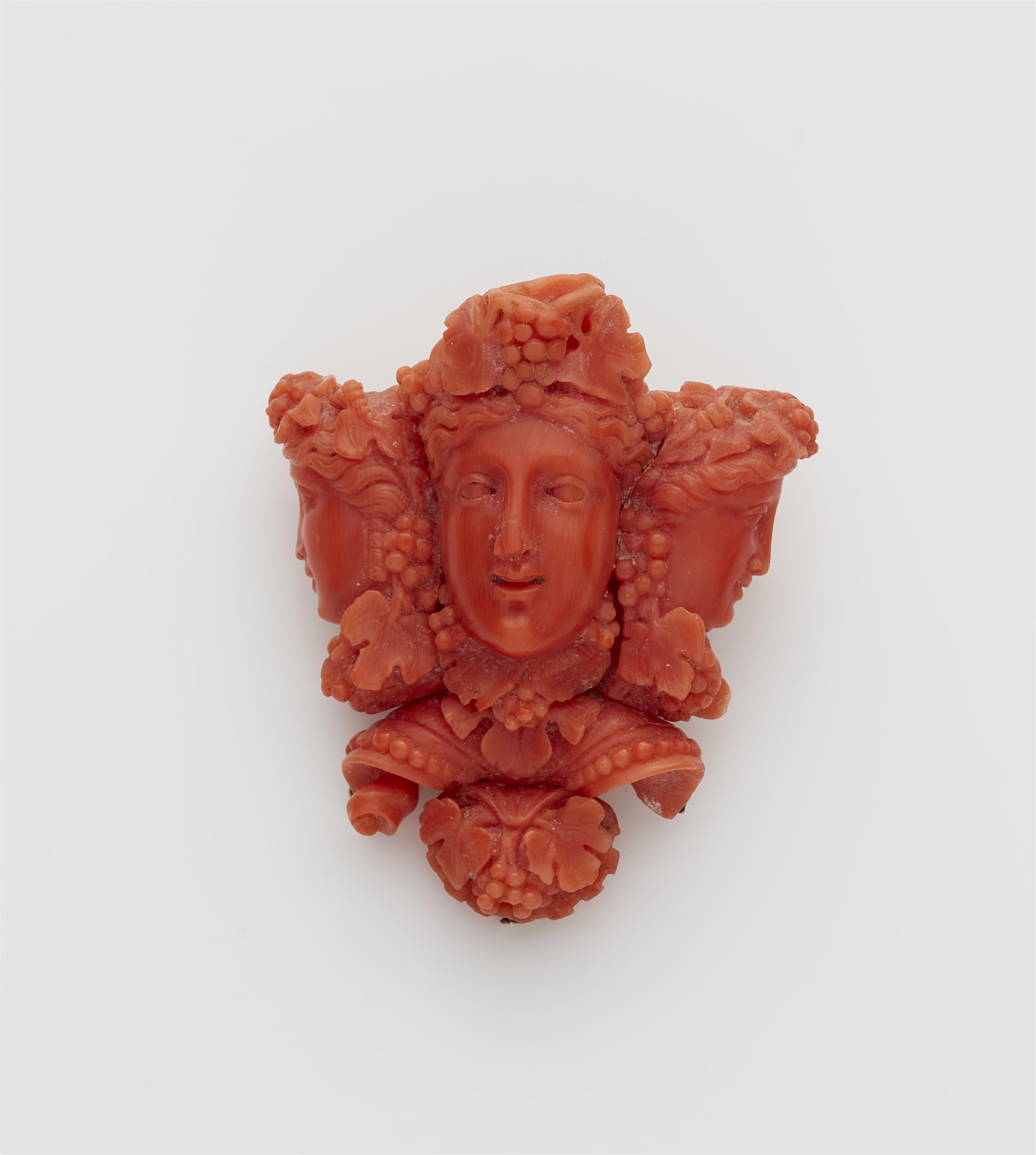 A Sicilian 14k gold and carved red coral cameo brooch. - image-1