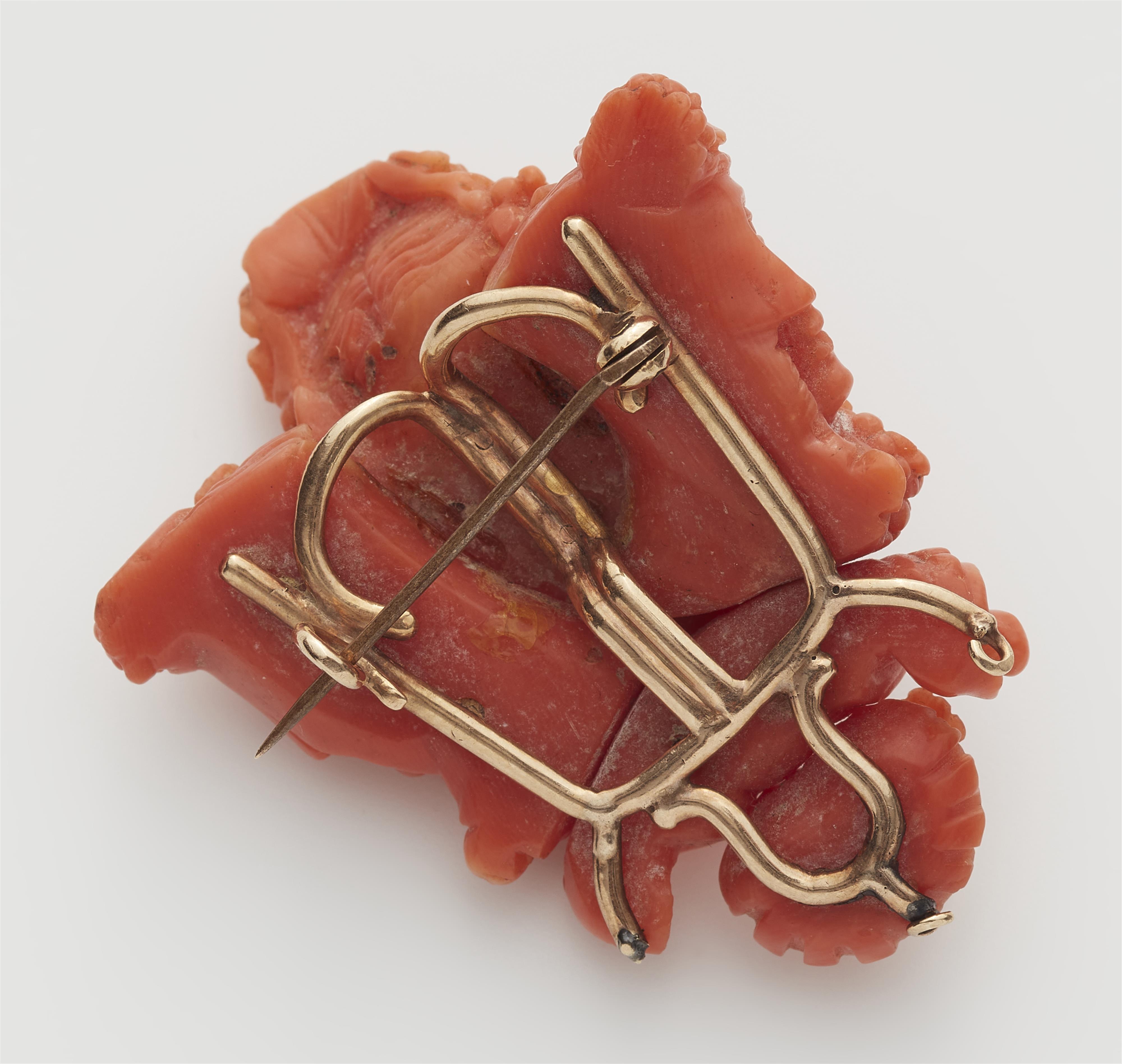 A Sicilian 14k gold and carved red coral cameo brooch. - image-2