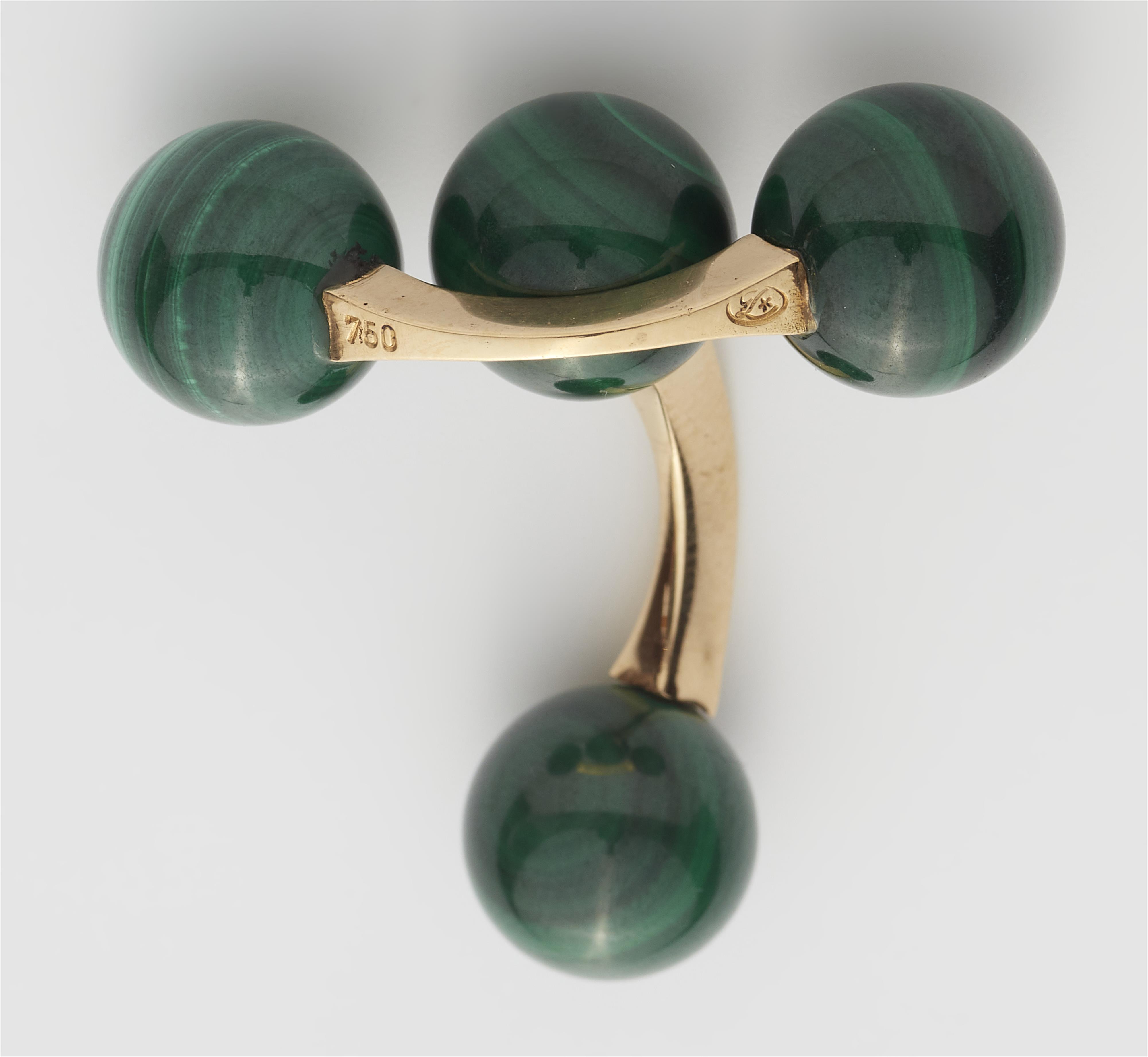 A pair of 18k gold and malachite ball cufflinks. - image-2