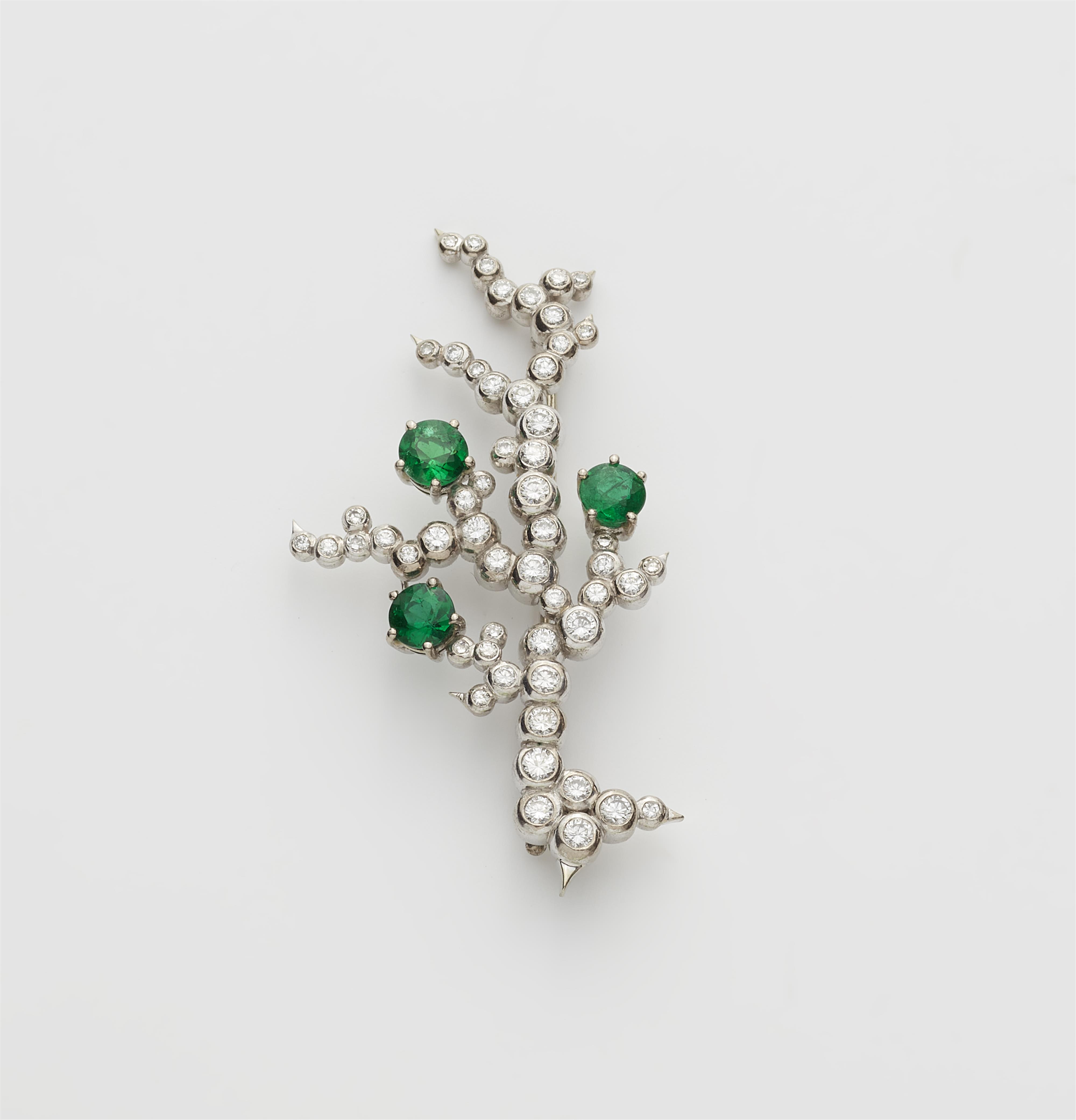 A German 18k gold diamond and emerald flower brooch. - image-3