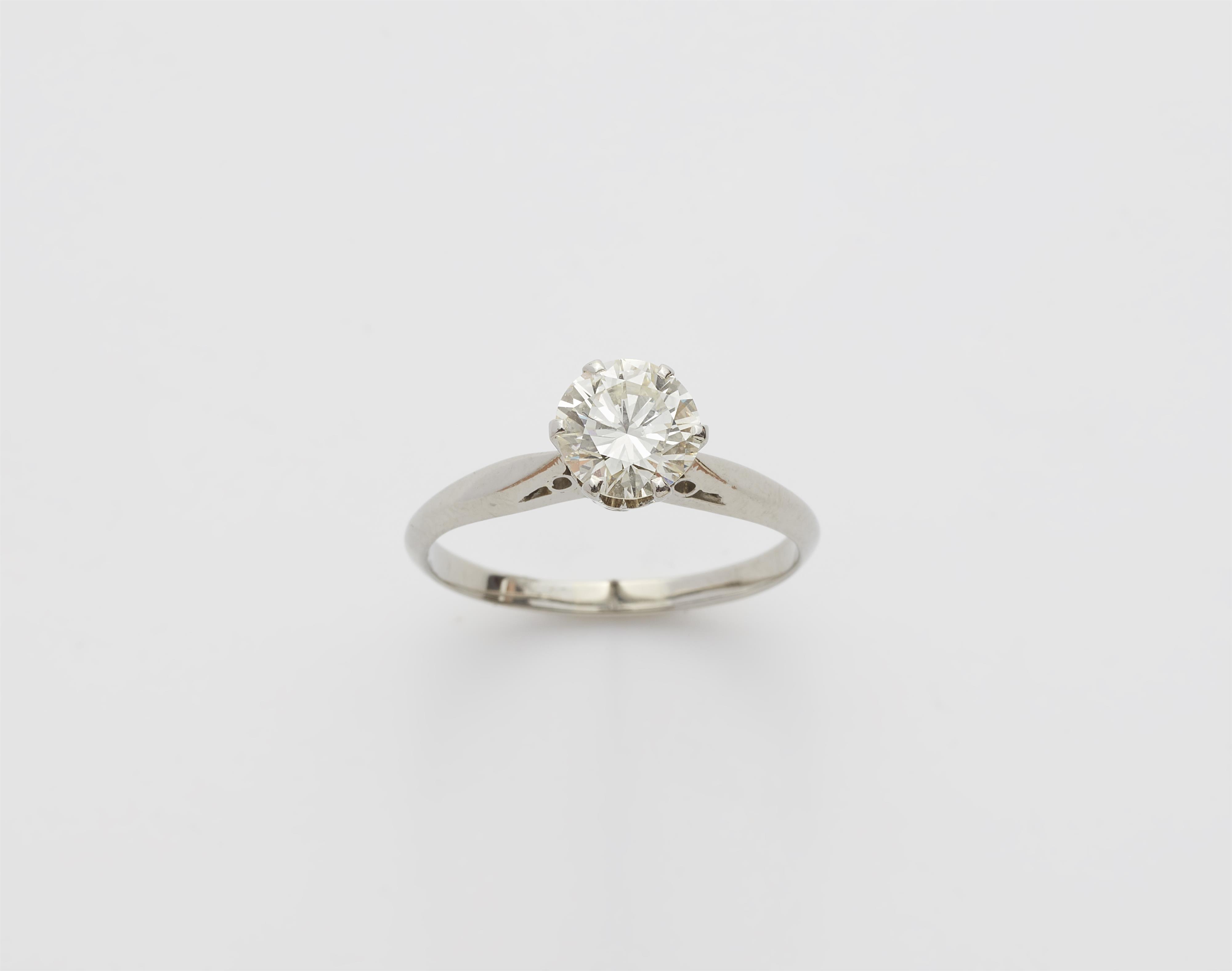 An 18k gold and c. 0.92 ct brilliant-cut diamond solitaire ring. - image-1