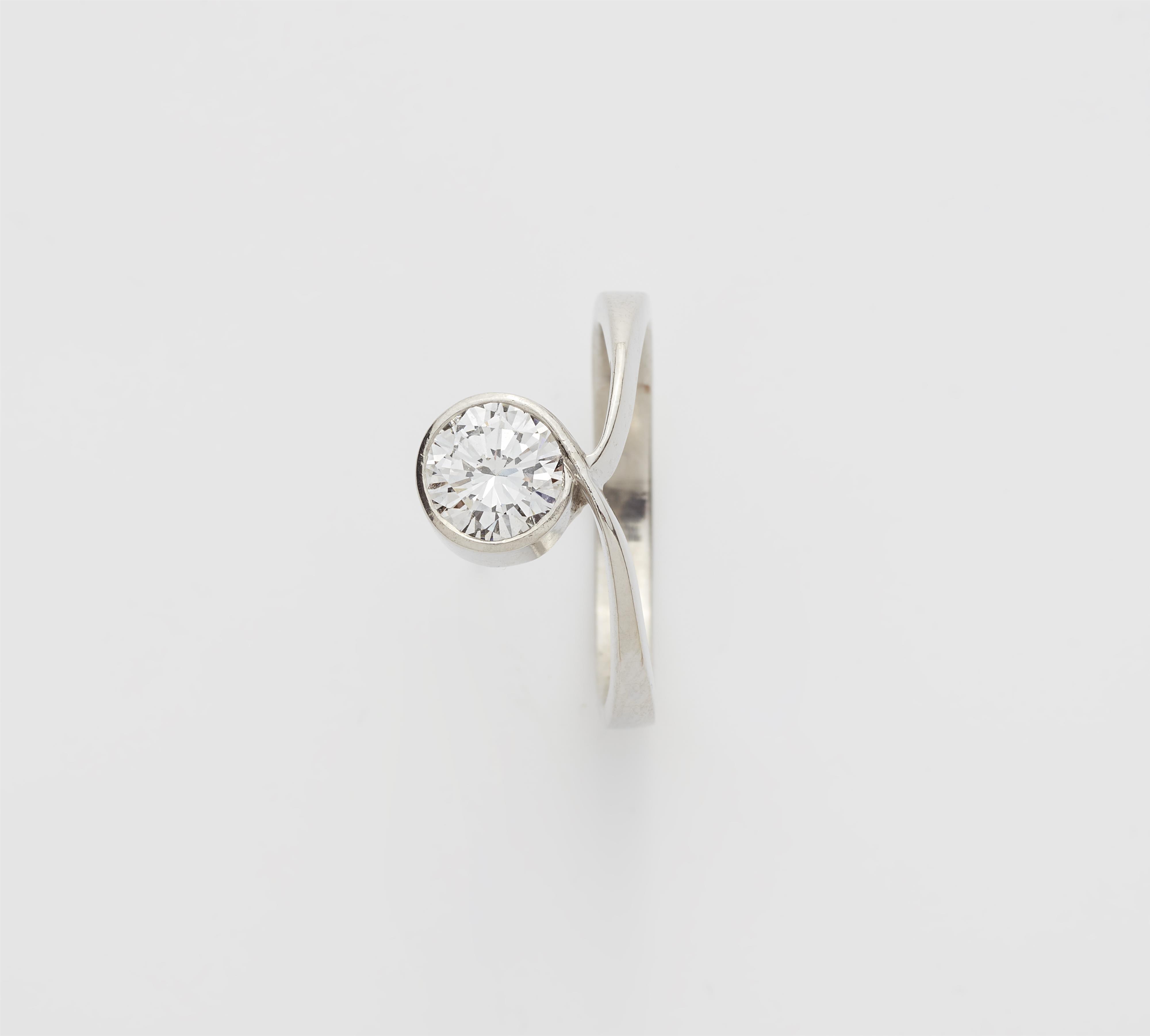 A platinum and c. 1.07 ct brilliant-cut diamond solitaire ring. - image-1