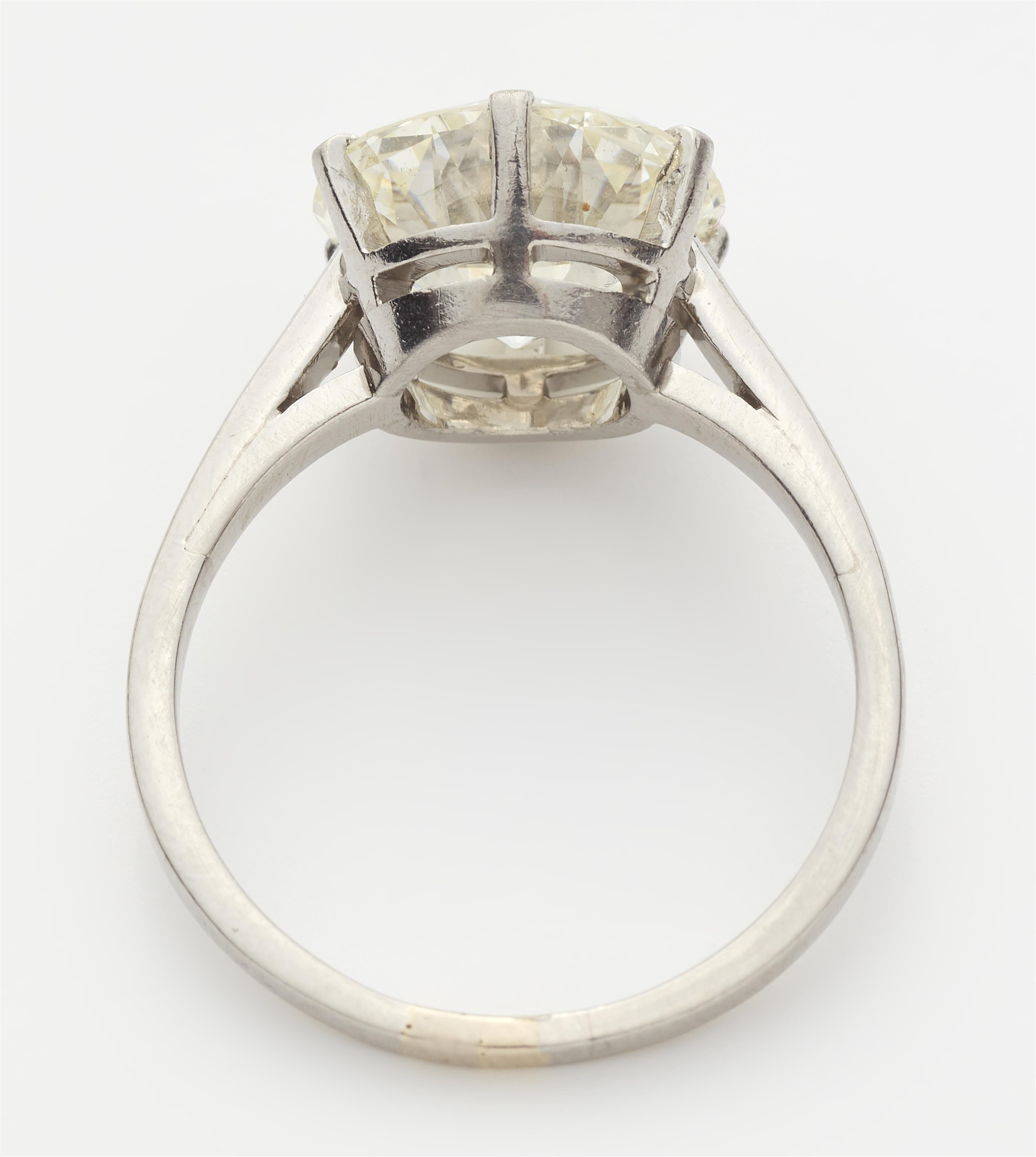 A 14k white gold and diamond solitaire ring. - image-2