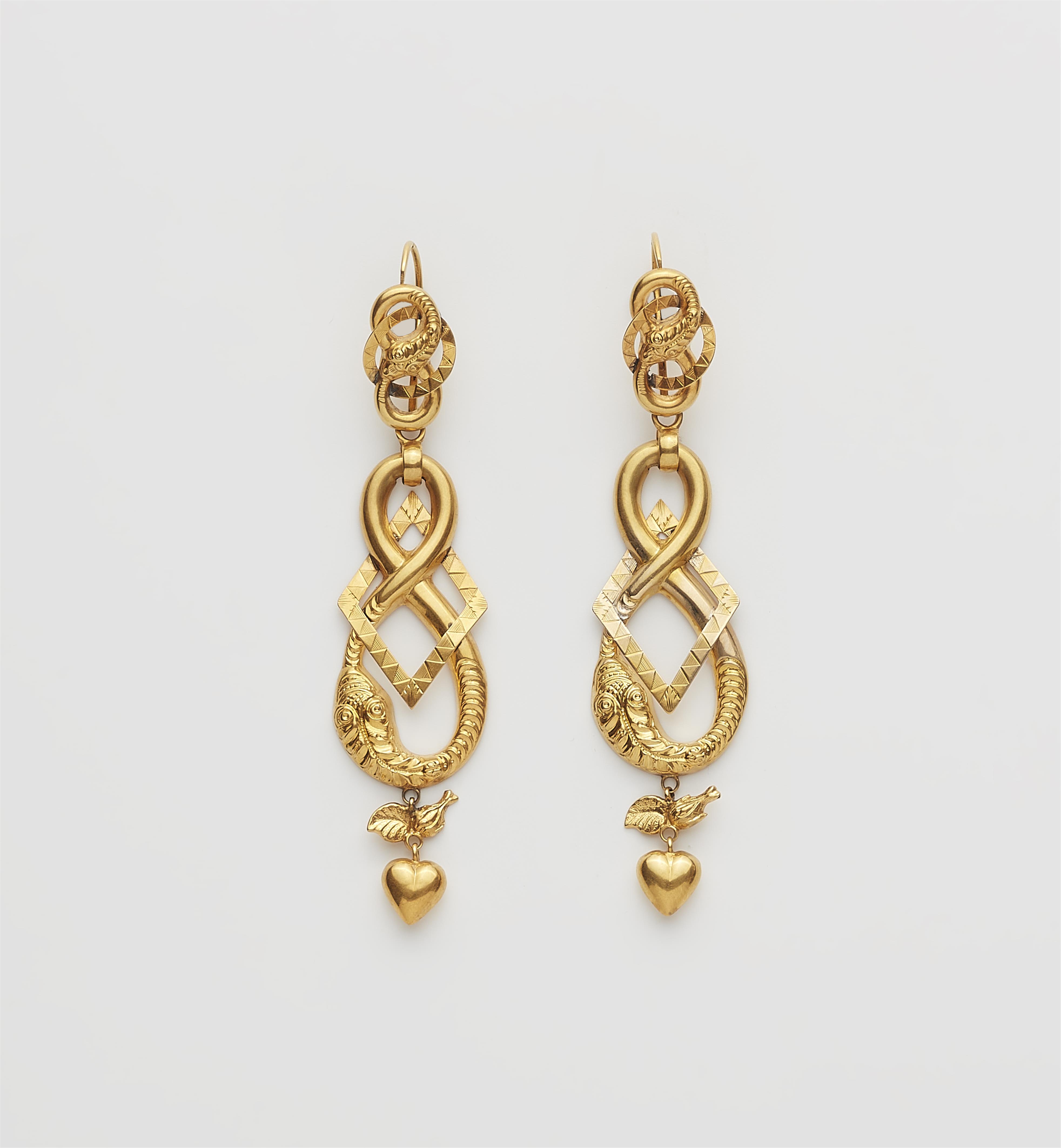 A pair of Victorian multi part gold repoussé pendant earrings. - image-1