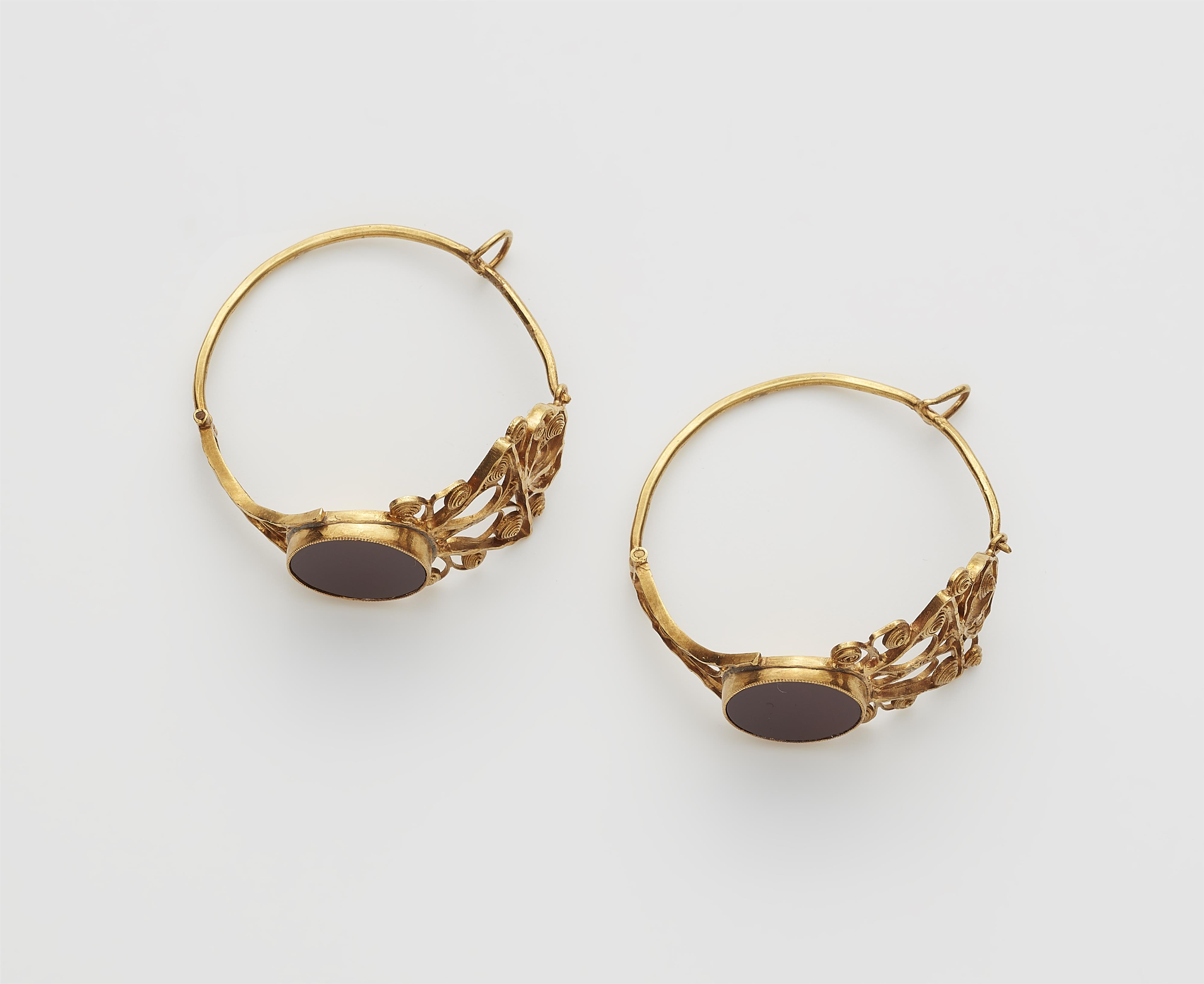 A pair of Neoclassical gold and carnelian hoop earrings. - image-1