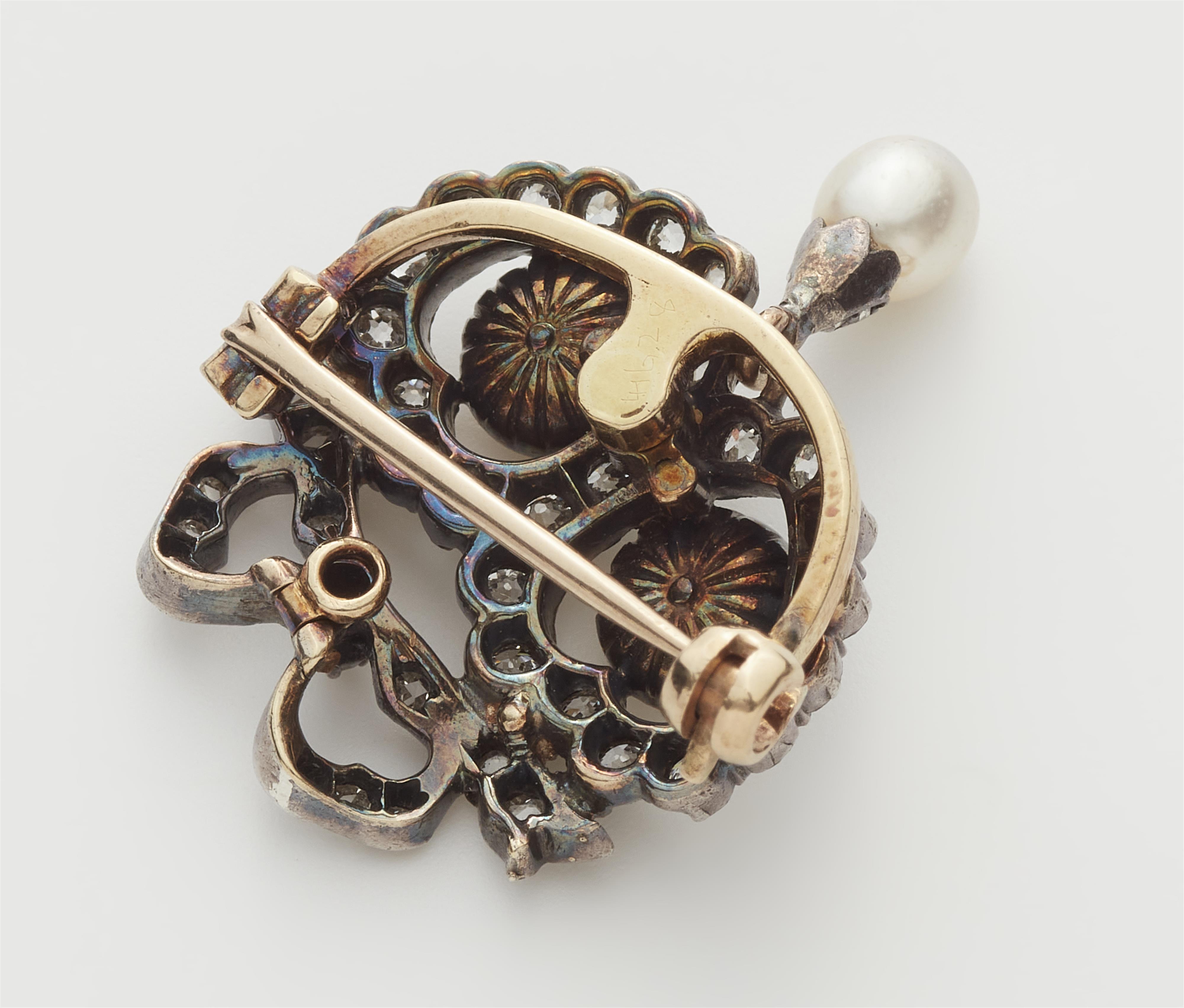 A small gold diamond and pearl Belle Epoque brooch formed as a pair of hearts. - image-2