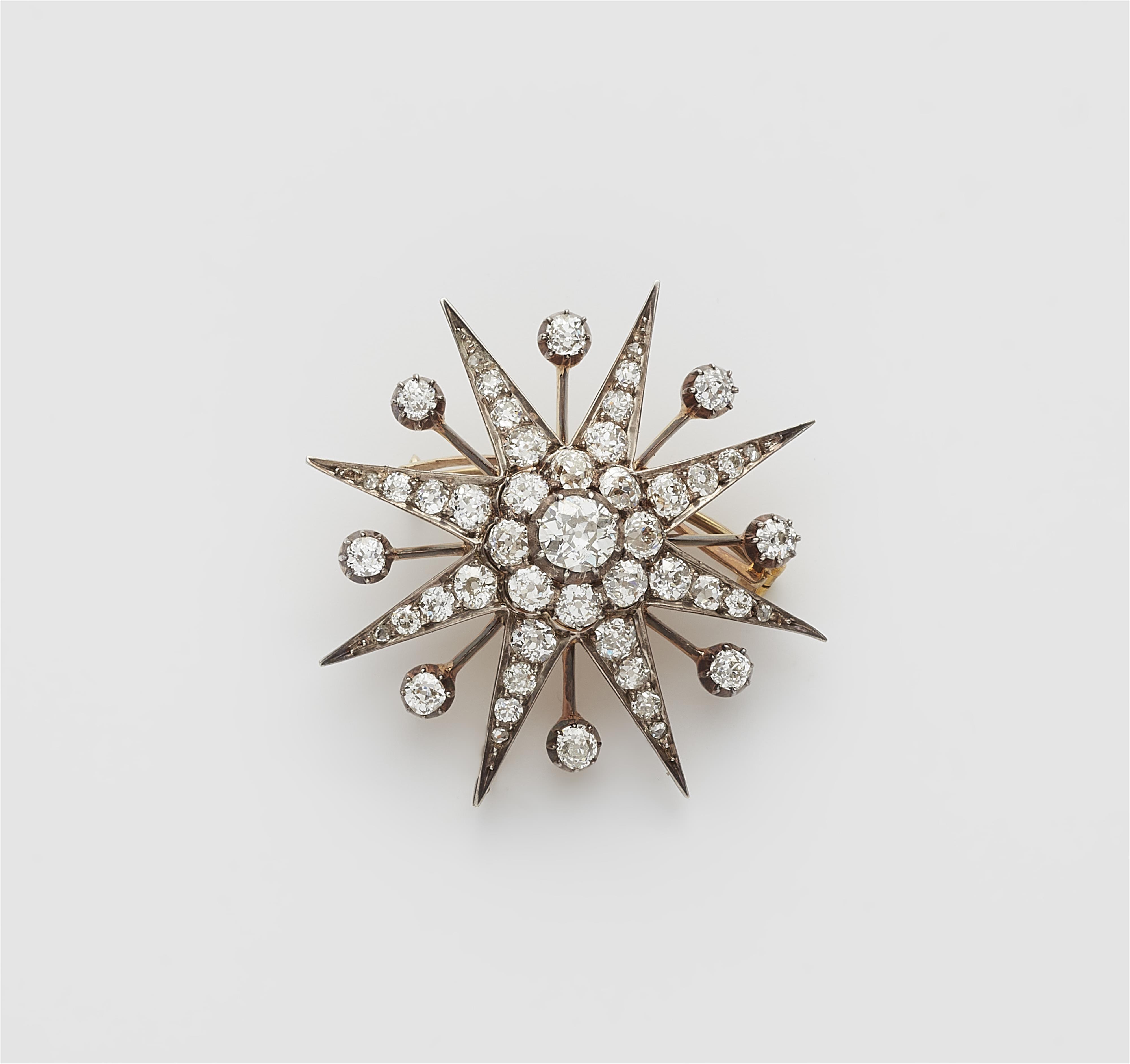 A late 19th century 14 k gold and diamond star brooch. - image-1