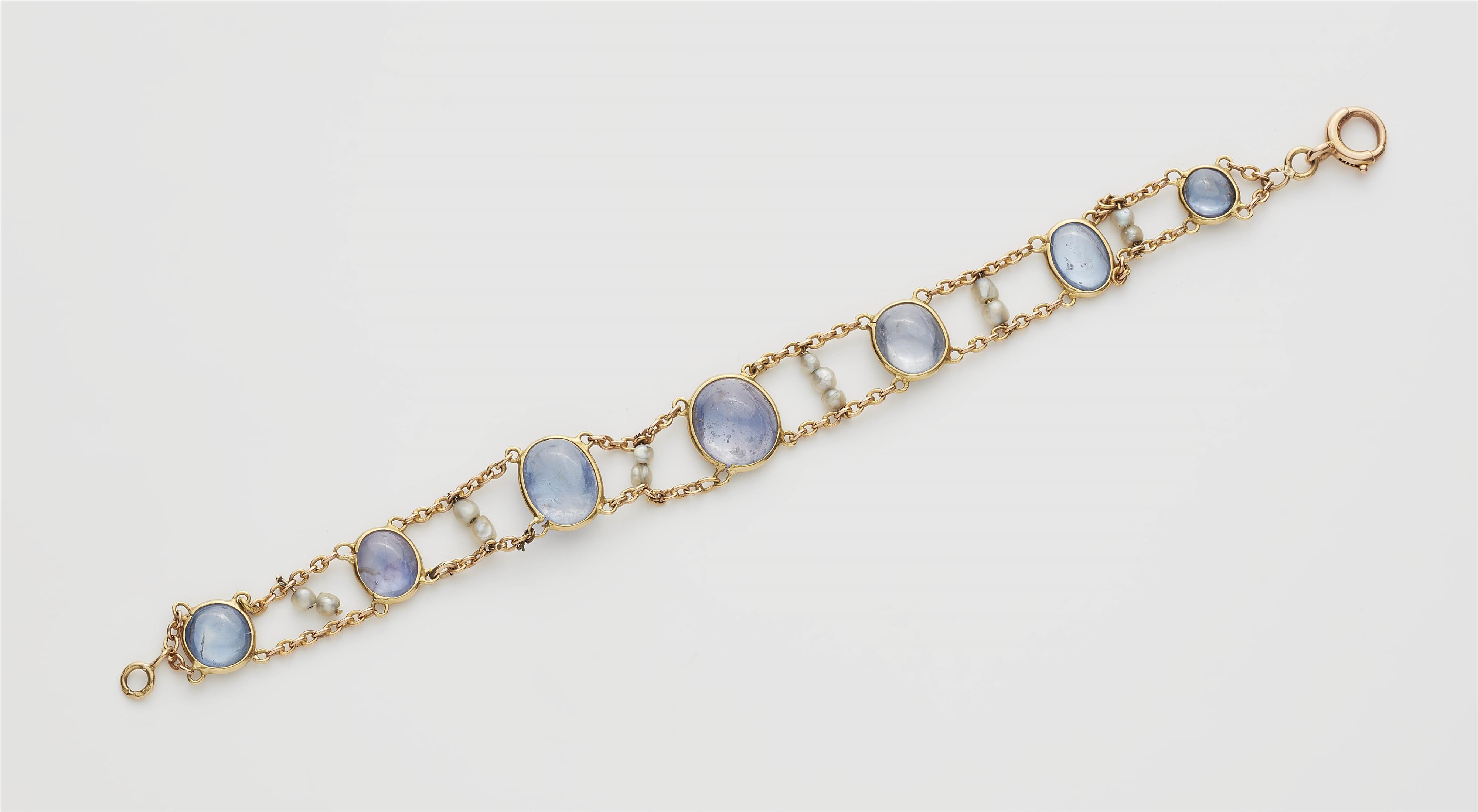 A French 18k gold natural freshwater pearl and Ceylon sapphire bracelet. - image-1