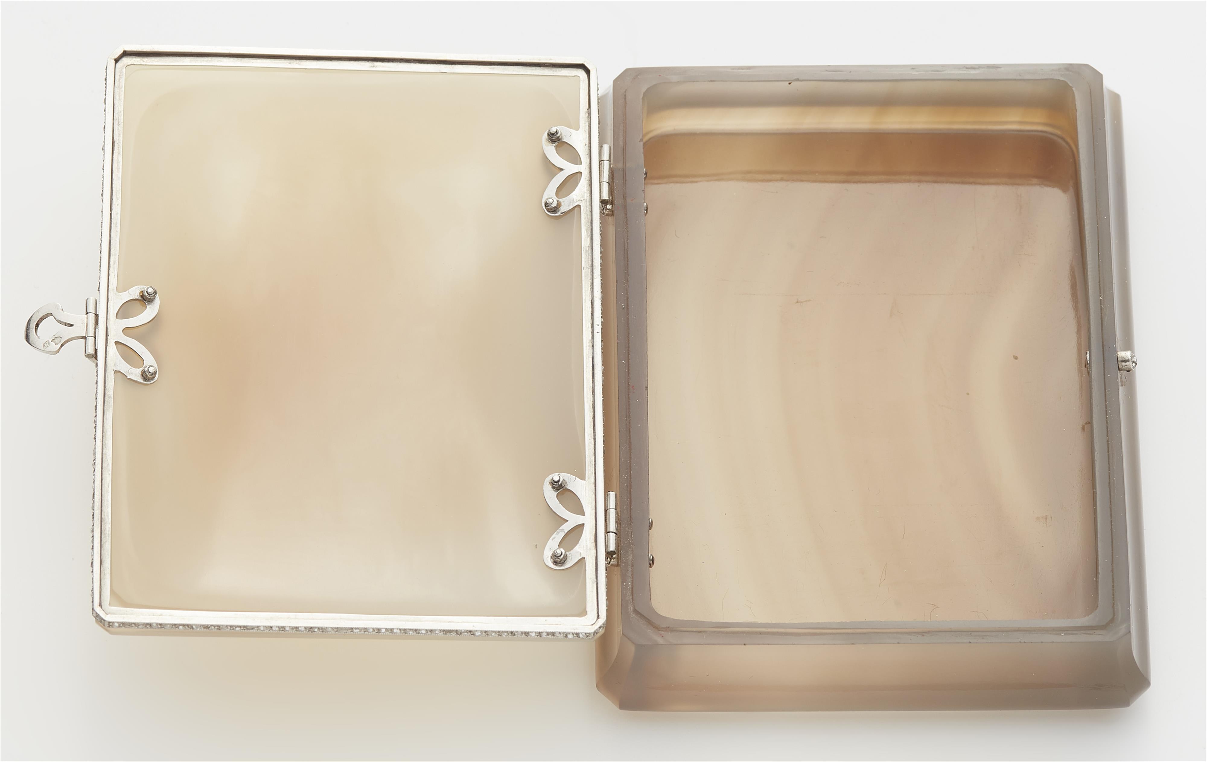 A French platinum chalcedony and diamond Art Déco cigarette case. - image-2