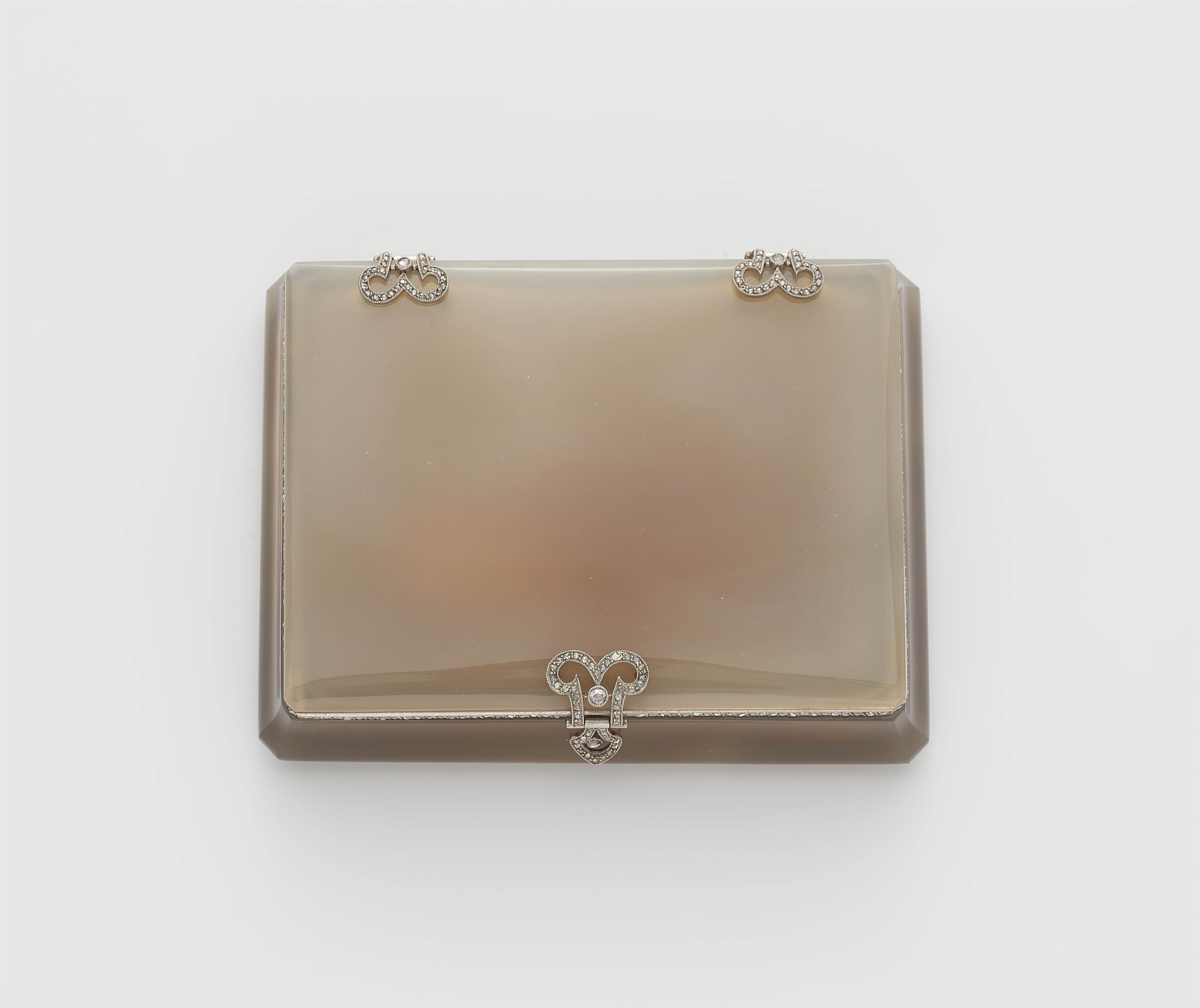 A French platinum chalcedony and diamond Art Déco cigarette case. - image-1