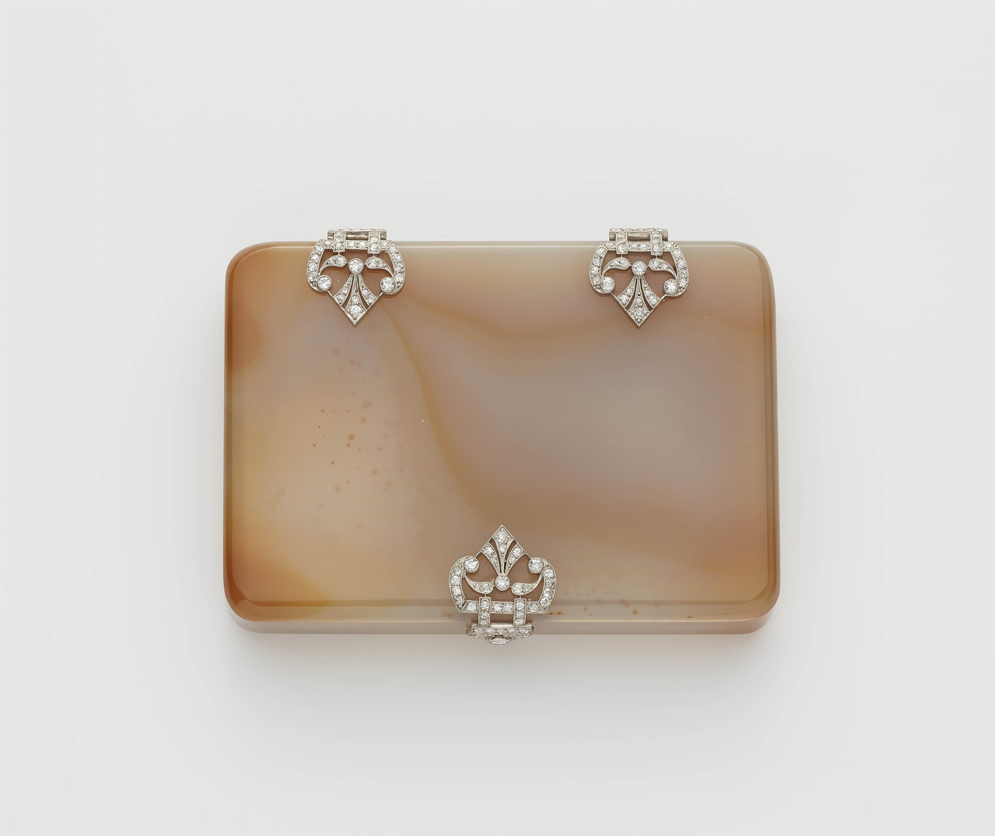 An Art Déco platinum chalcedony and diamond cigarette case. - image-1