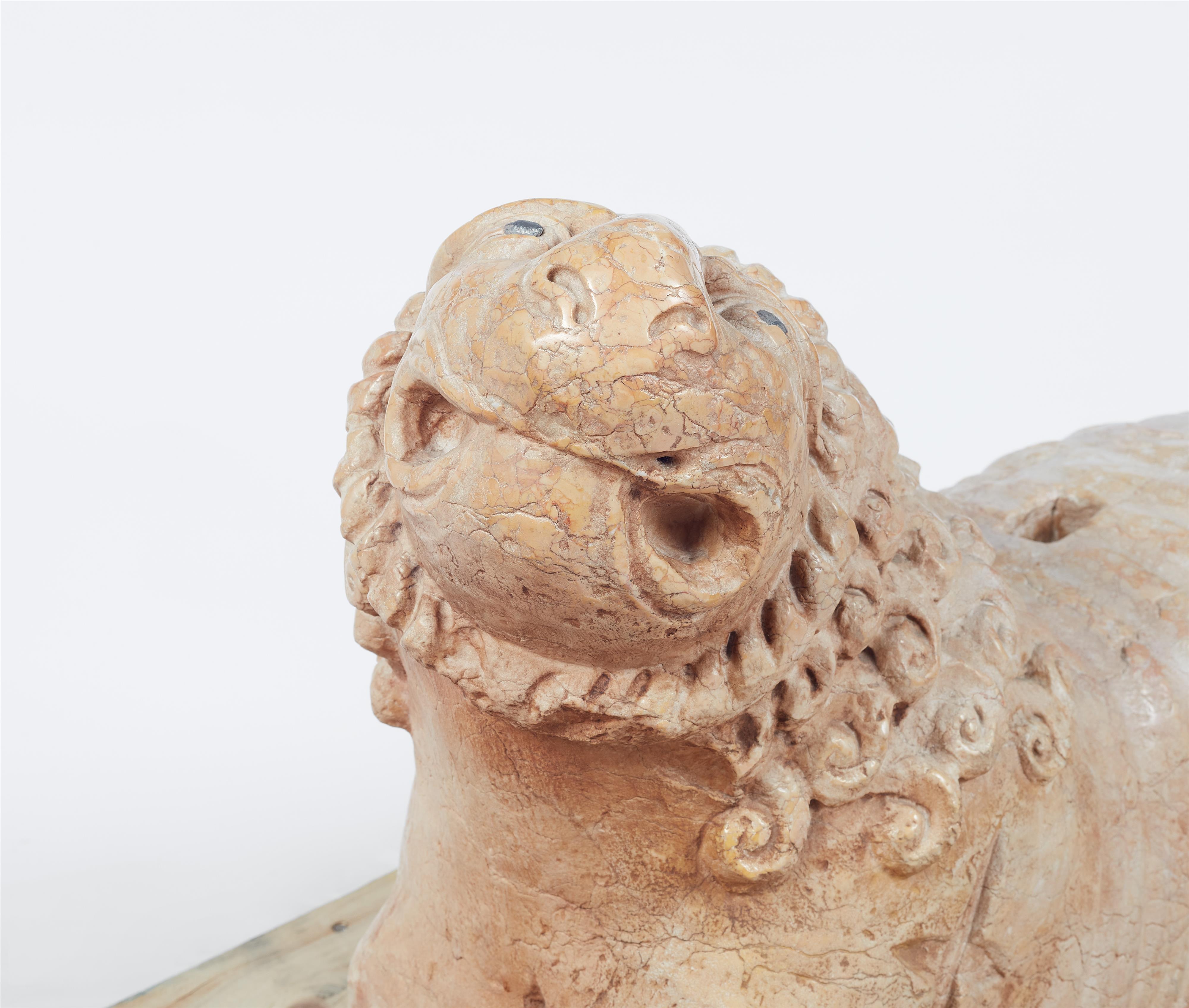 A pair of recumbent lion column bases - image-6
