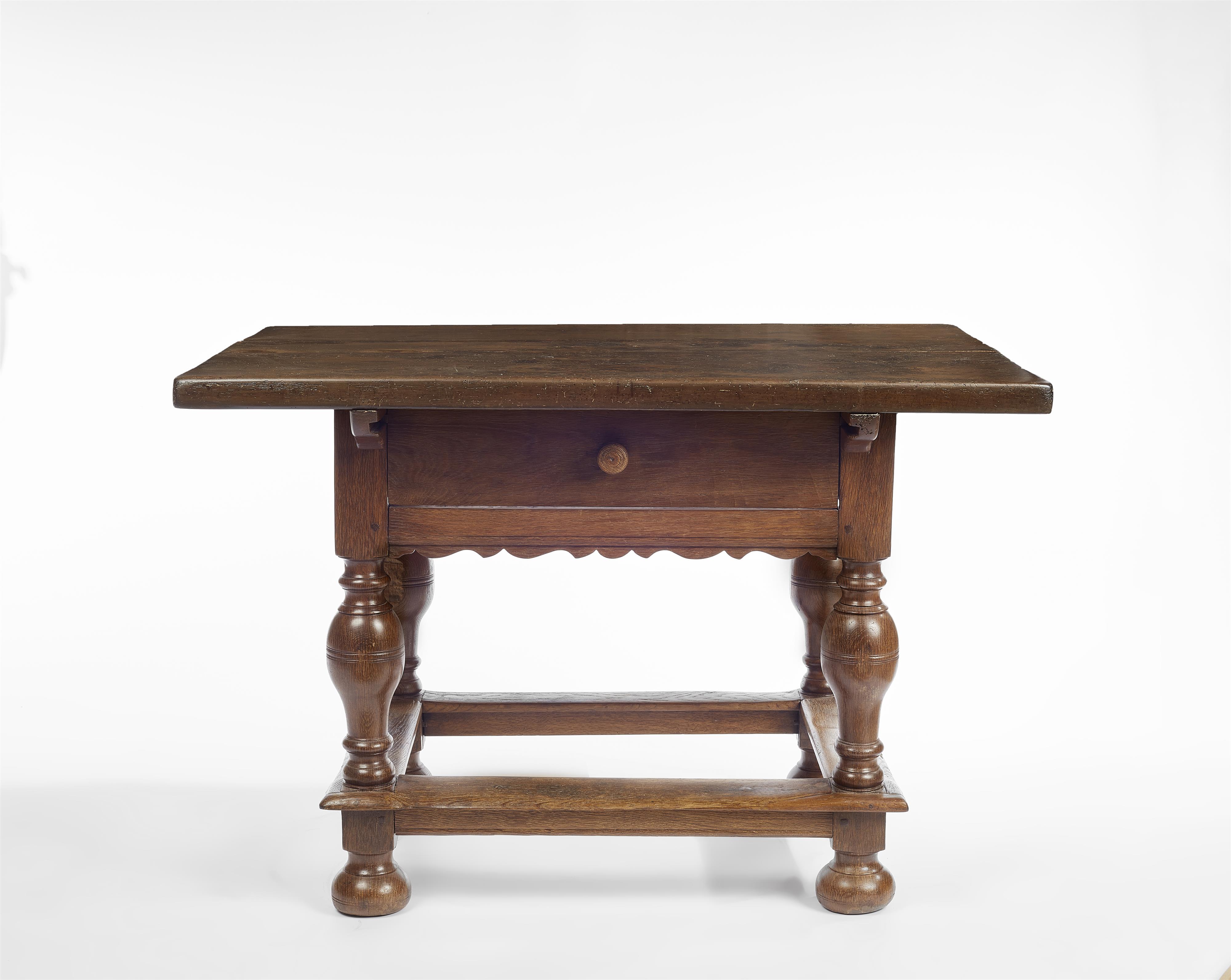 A solid oak and walnut Baroque table - image-1