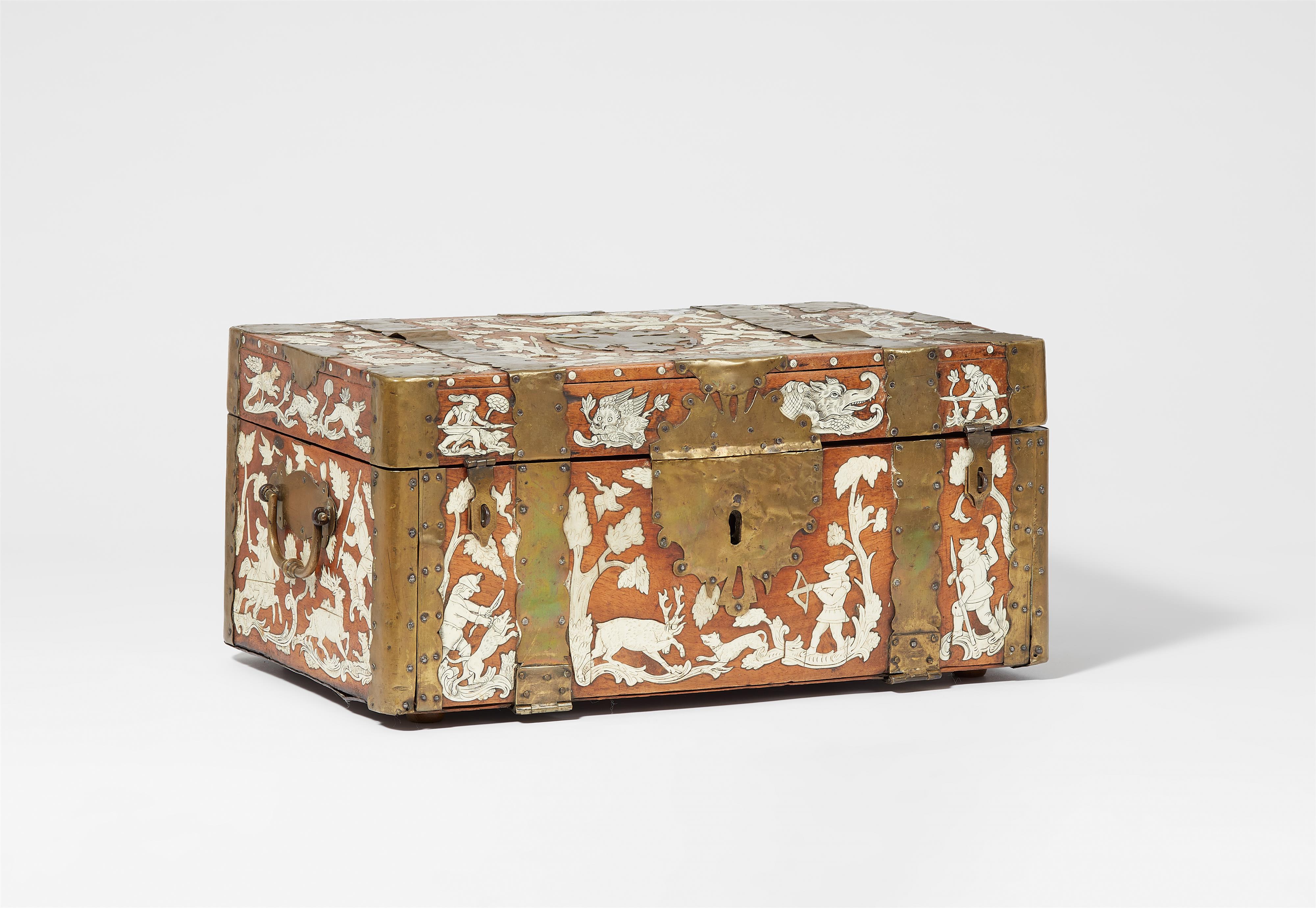 A travel chest inlaid in bone with hunting motifs - image-1