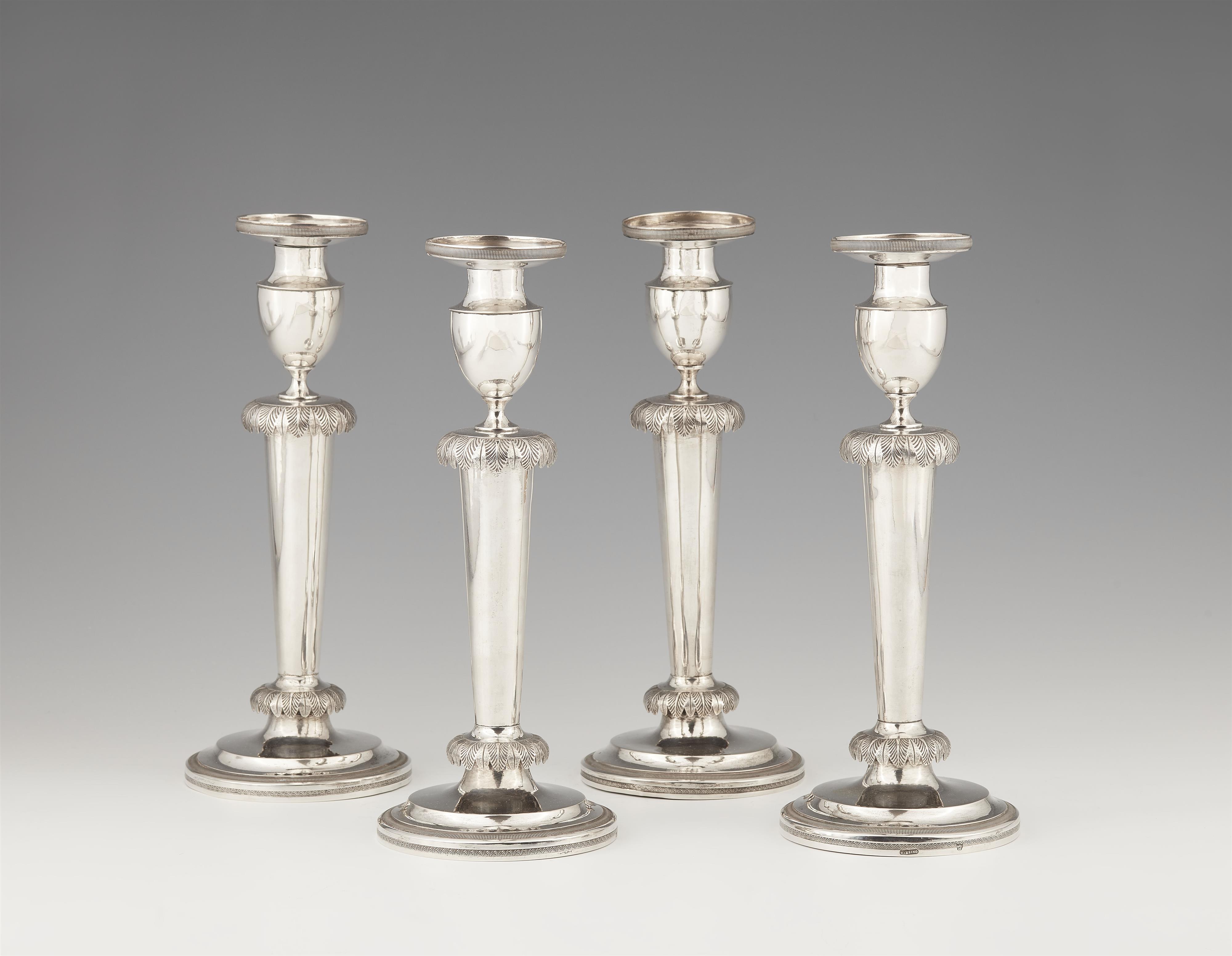 A set of four Würzburg silver candlesticks - image-1