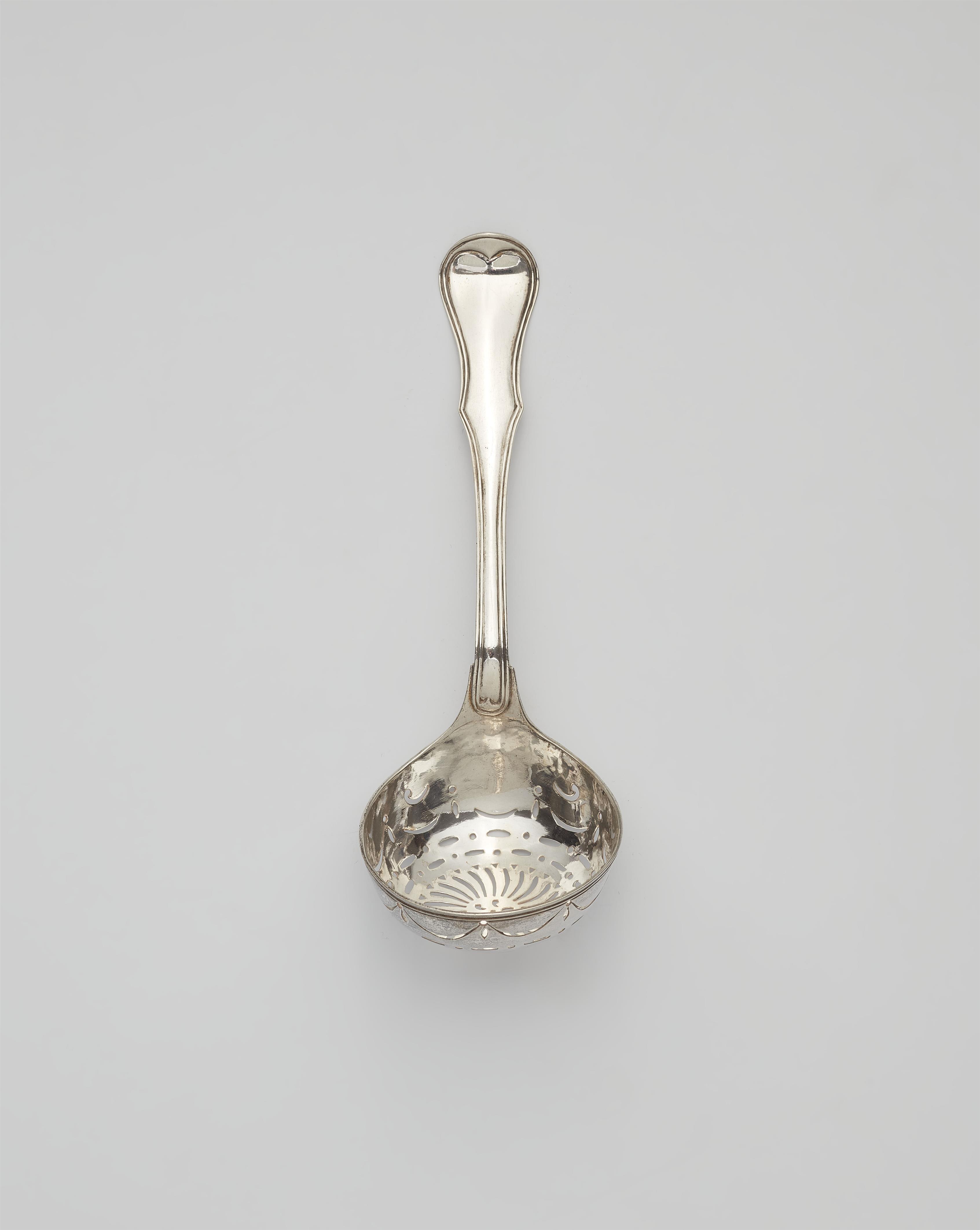 A Copenhagen silver sugar casting spoon - image-1