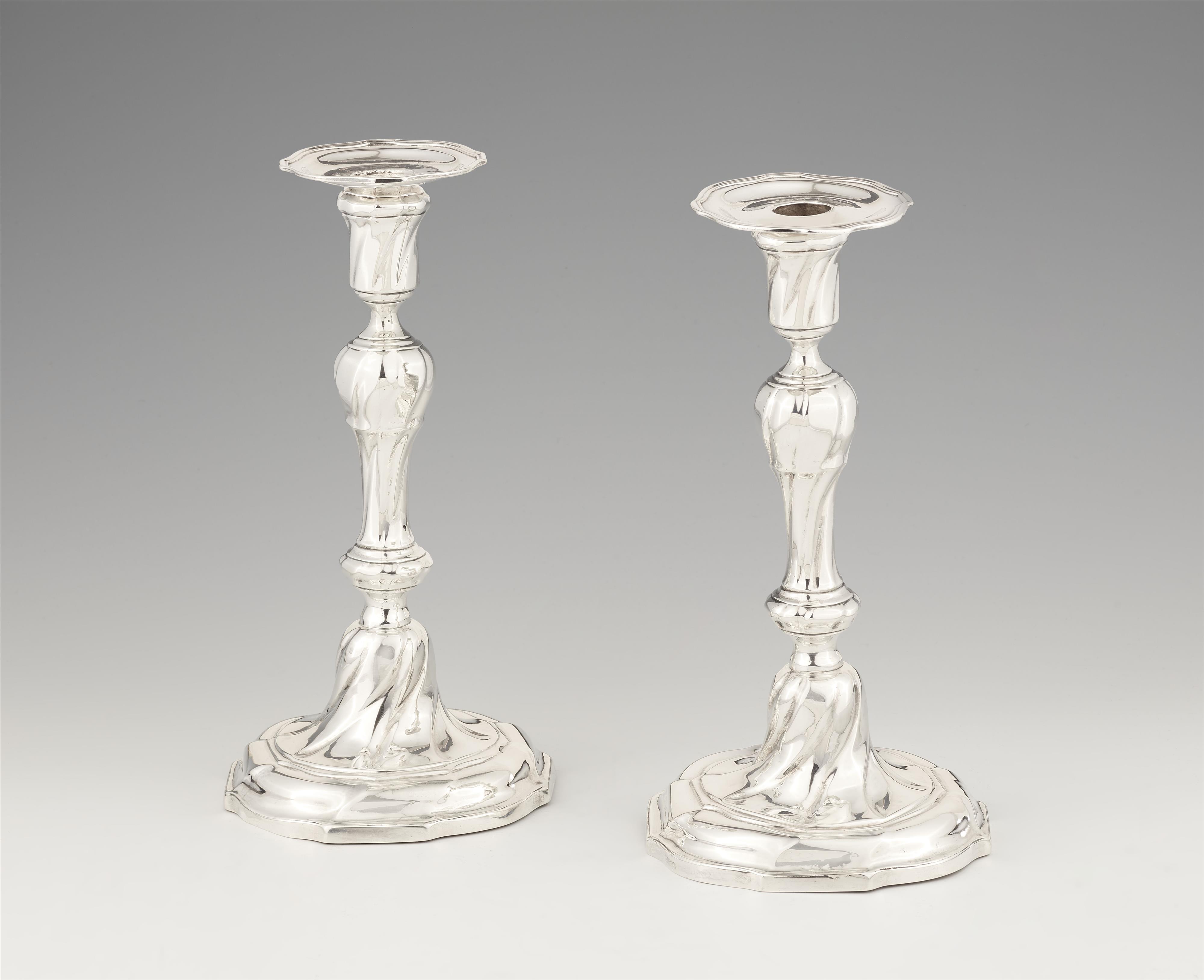 A pair of Antwerp silver candlesticks - image-1