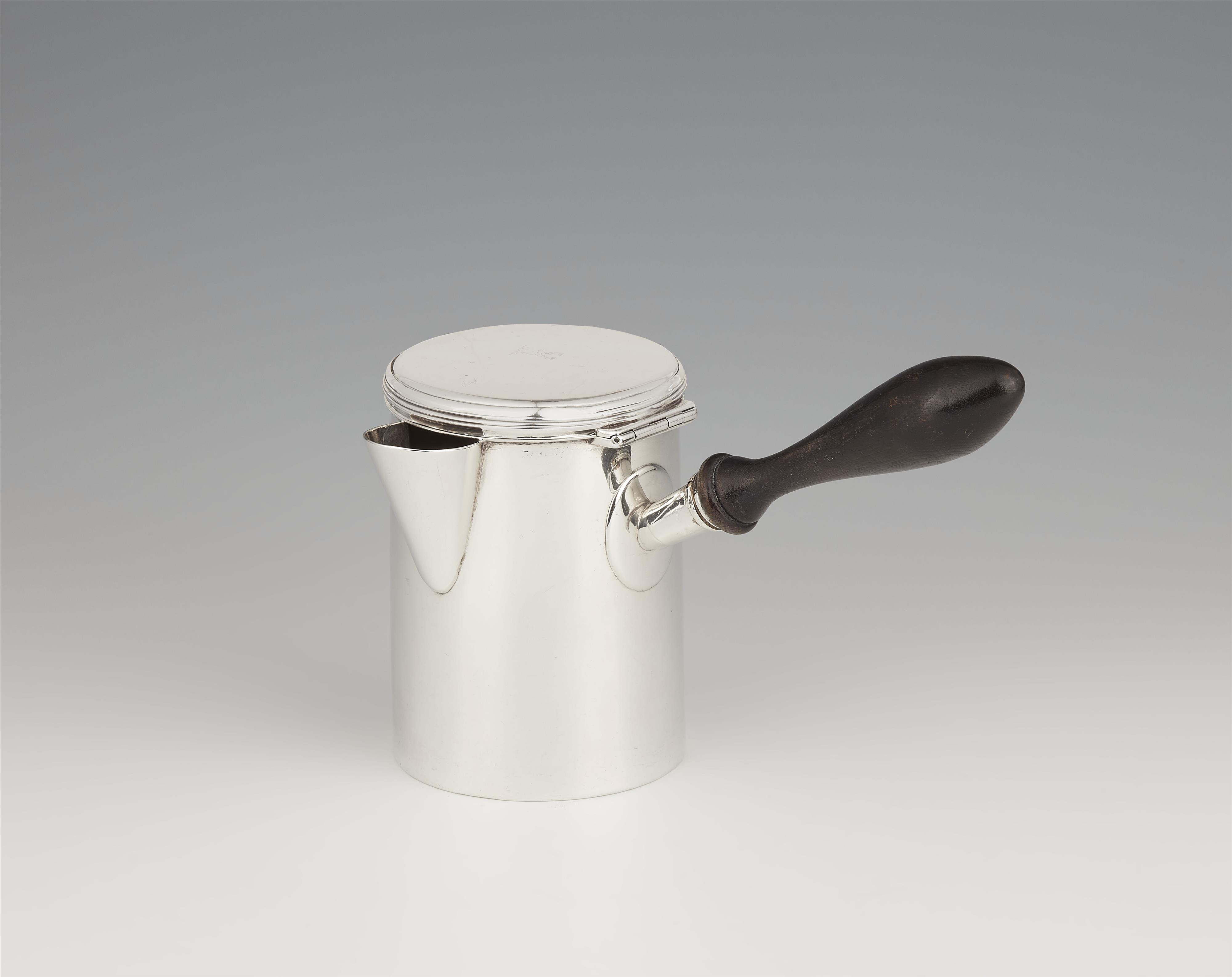A George III silver jug - image-1