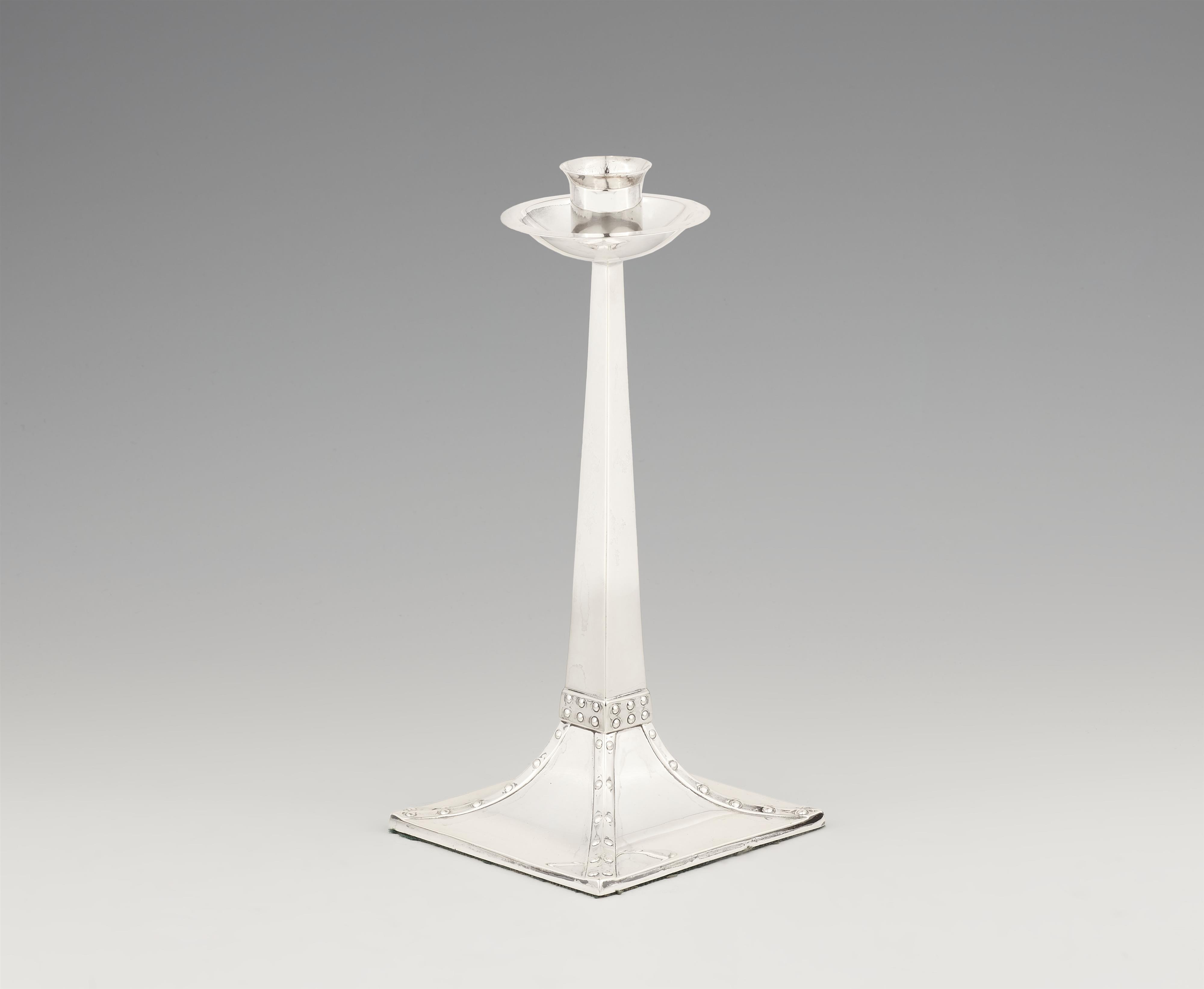 An Arts and Crafts silver candlestick - image-1