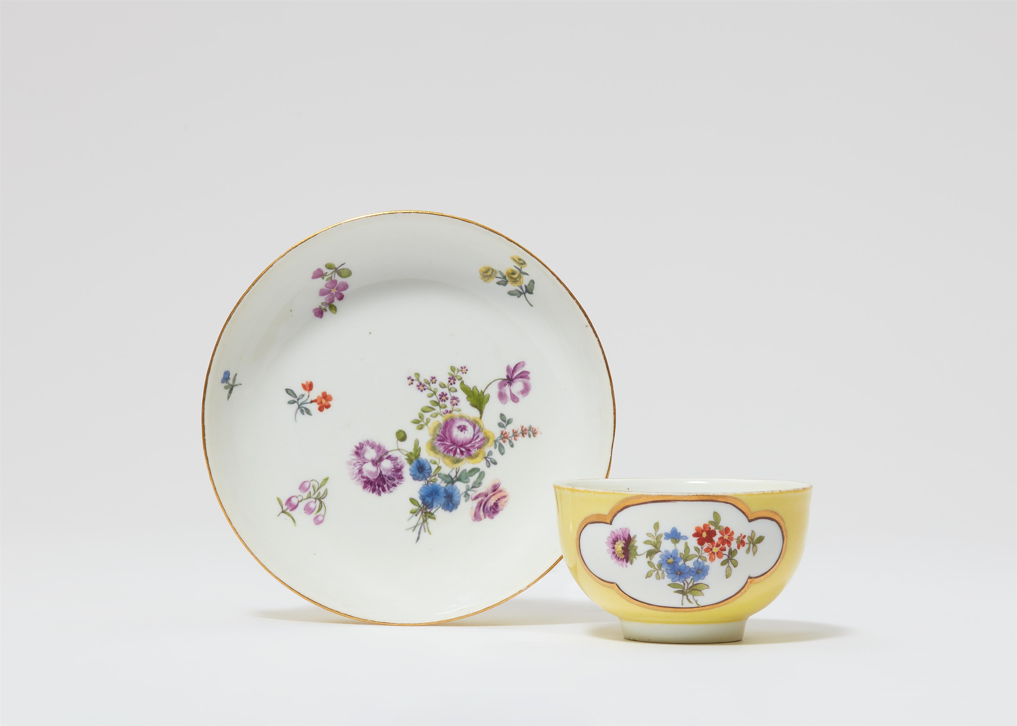 A Meissen porcelain teabowl and saucer with yellow ground - image-1
