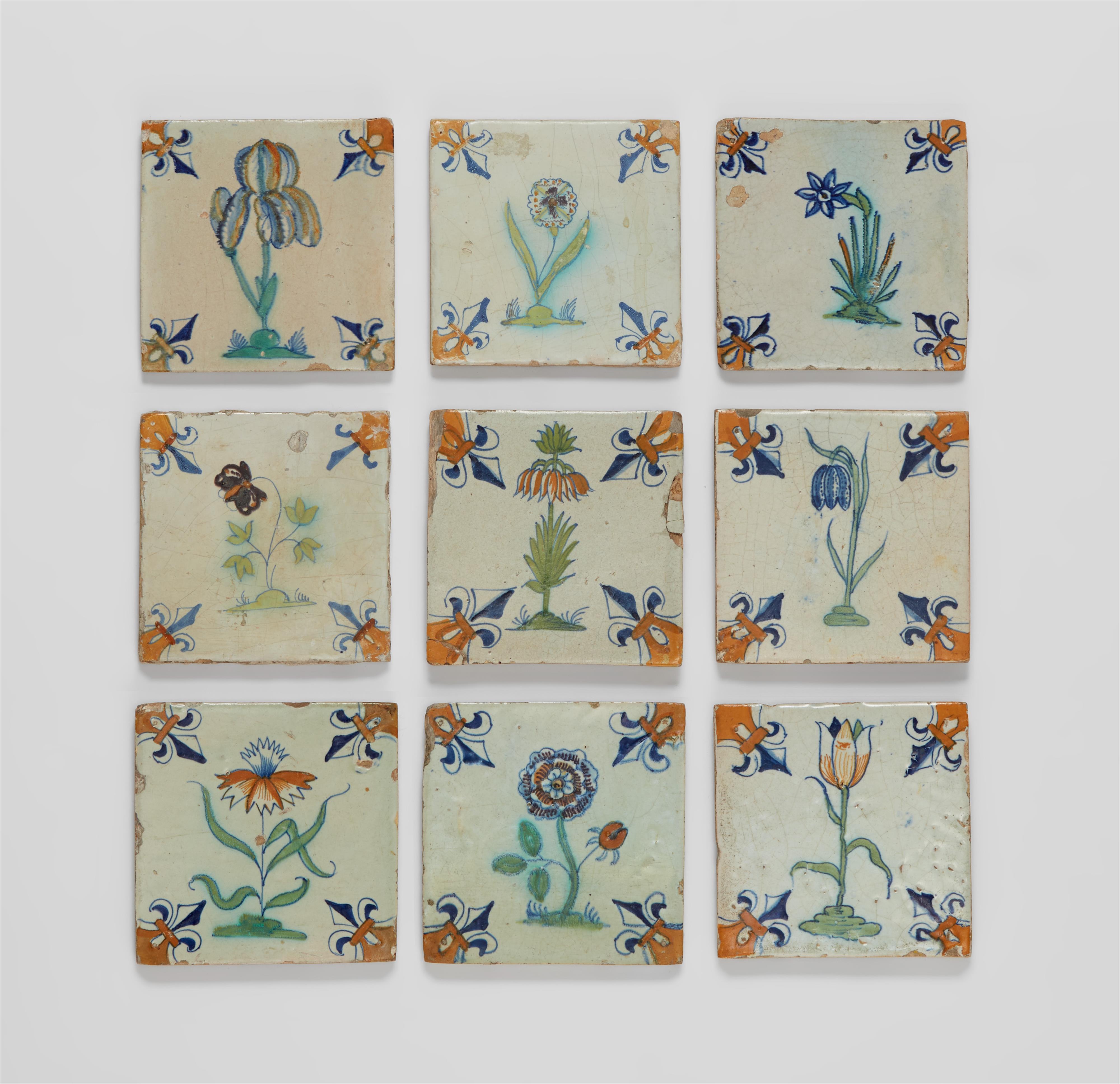 Nine Dutch faience tiles with floral decor - image-1