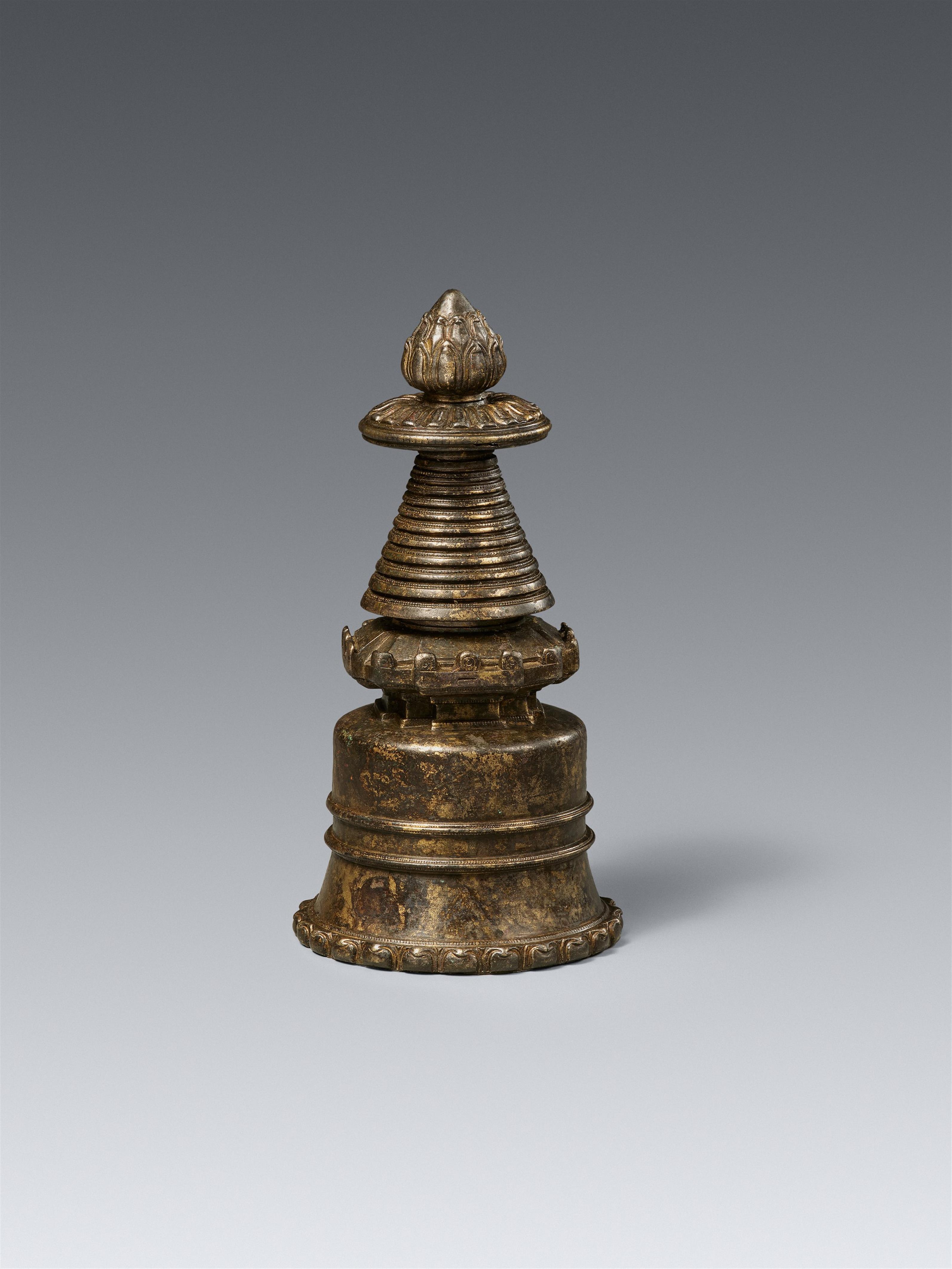 A Tibetan dark patinated copper alloy kadampa-stupa. 13th/14th century - image-1
