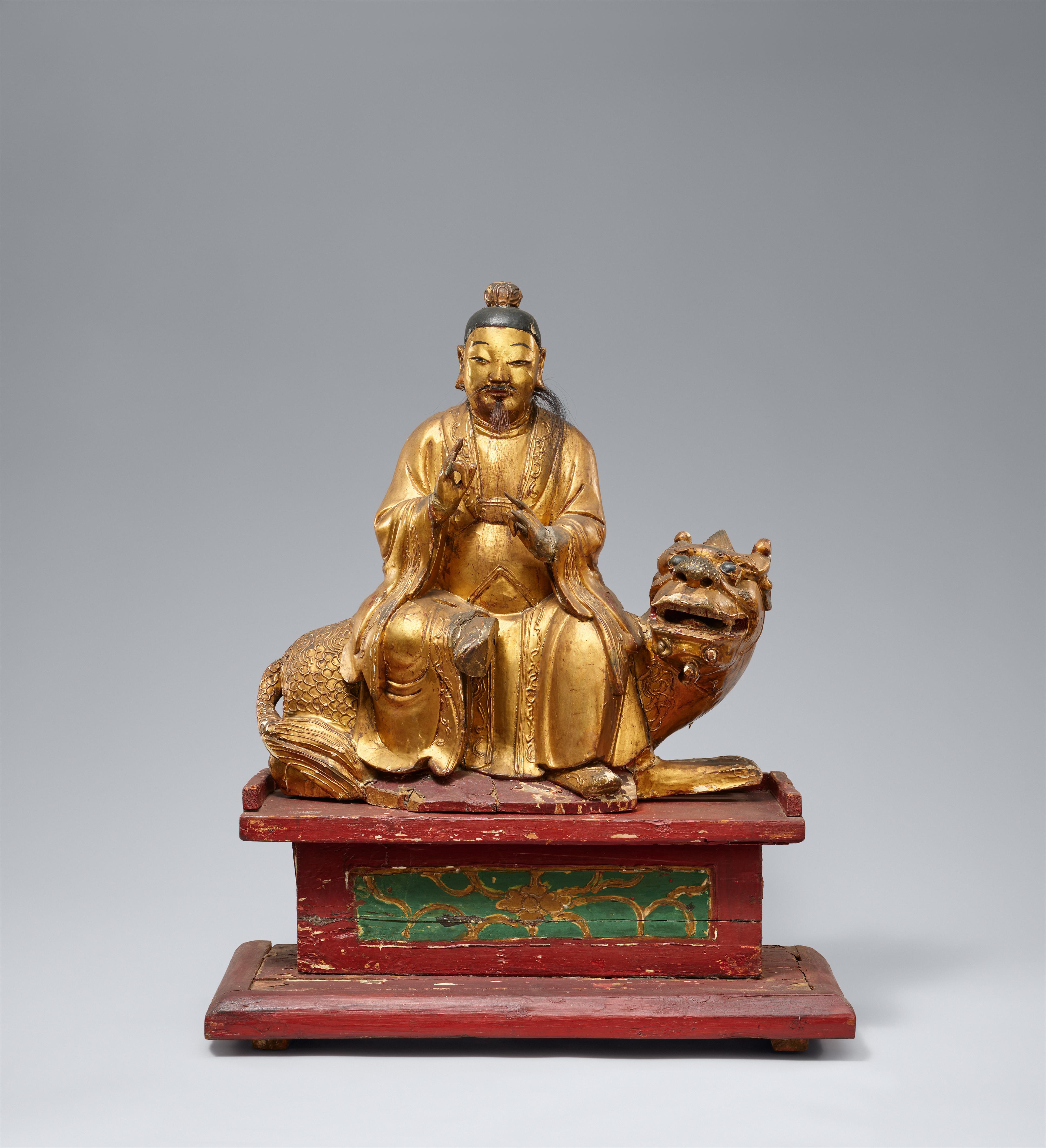 Daoistische Gottheit auf Löwe. Holz mit vergoldeter Lackfassung. Qing-Zeit - image-1