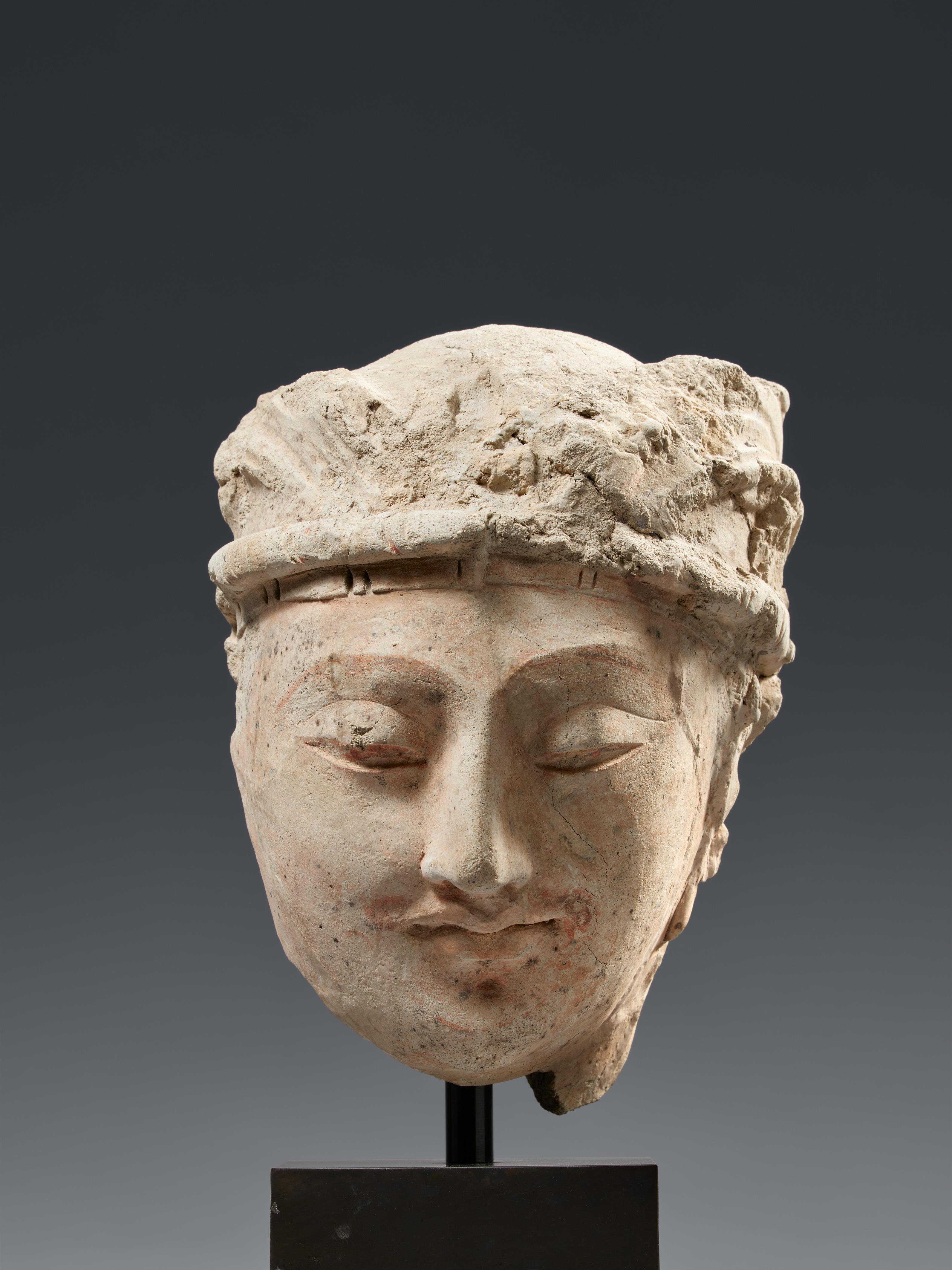 A Gandhara stucco head of a bodhisattva. Pakistan/Afghanistan. 2nd/3rd century - image-1