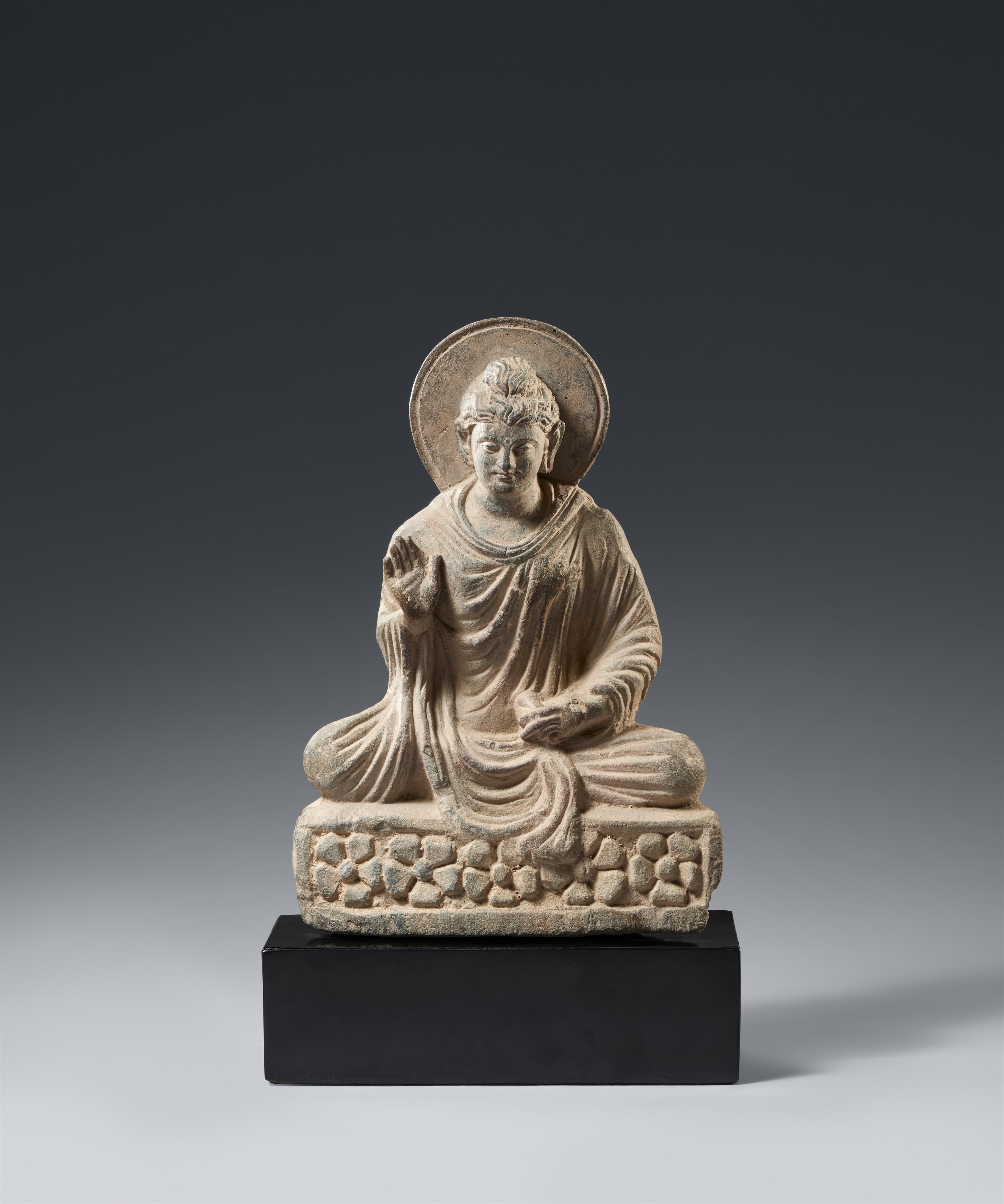 A grey sandstone Gandhara figure of a Buddha. Afganisthan/Pakistan. Probably 2nd century - image-1