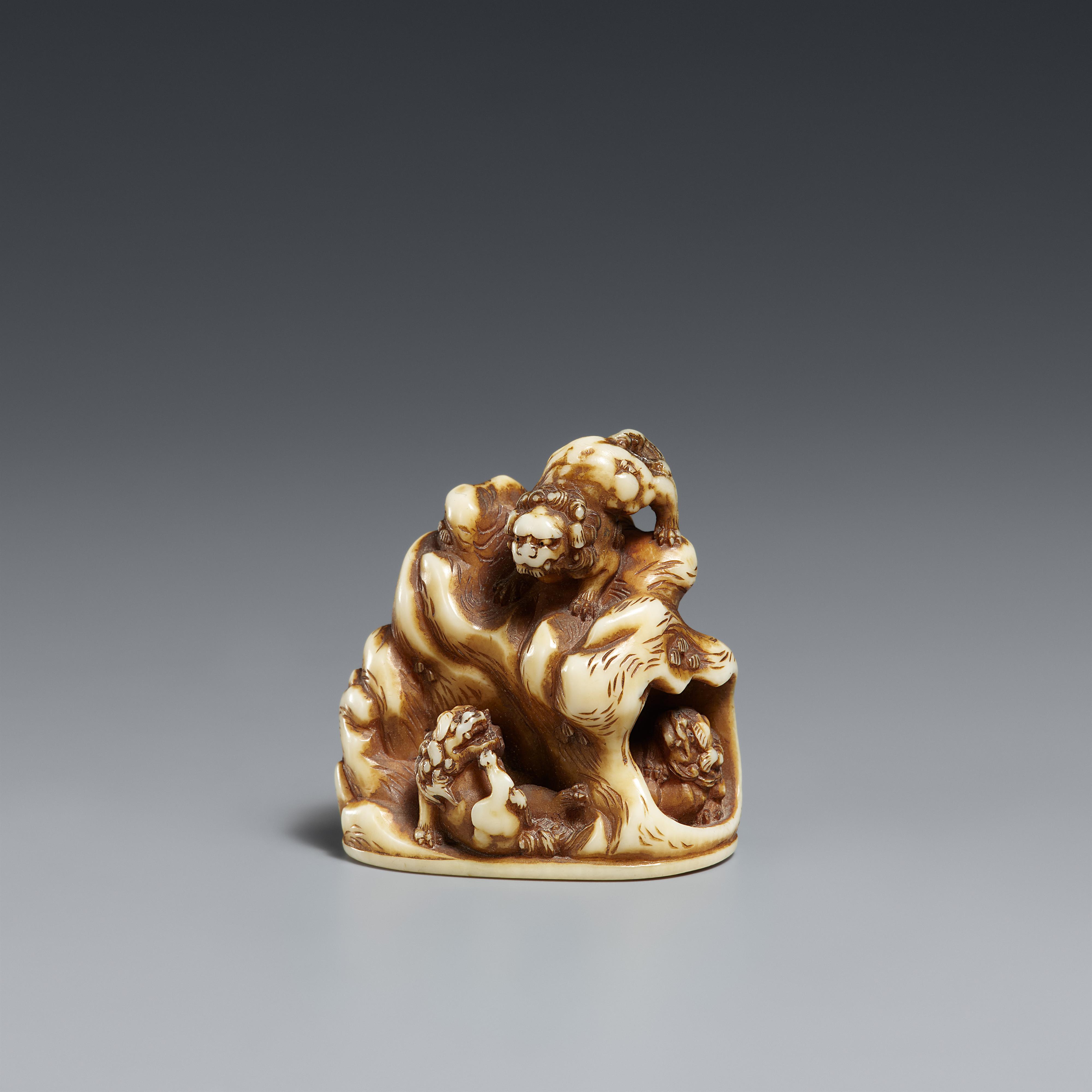 A stained ivory netsuke of five shishi. Mid-19th century - image-1