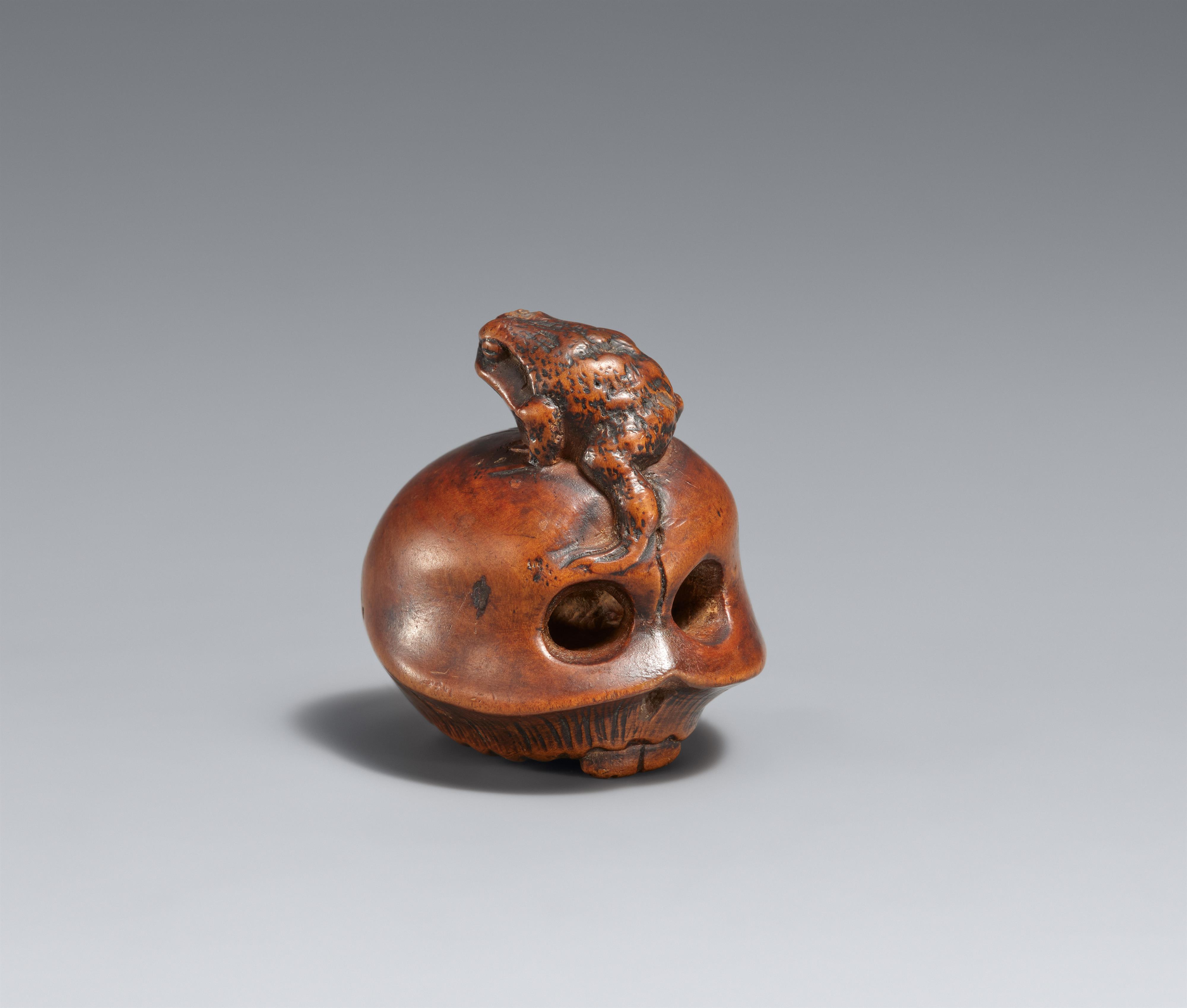 A boxwood netsuke of a skull and toad. Second half 19th century - image-1