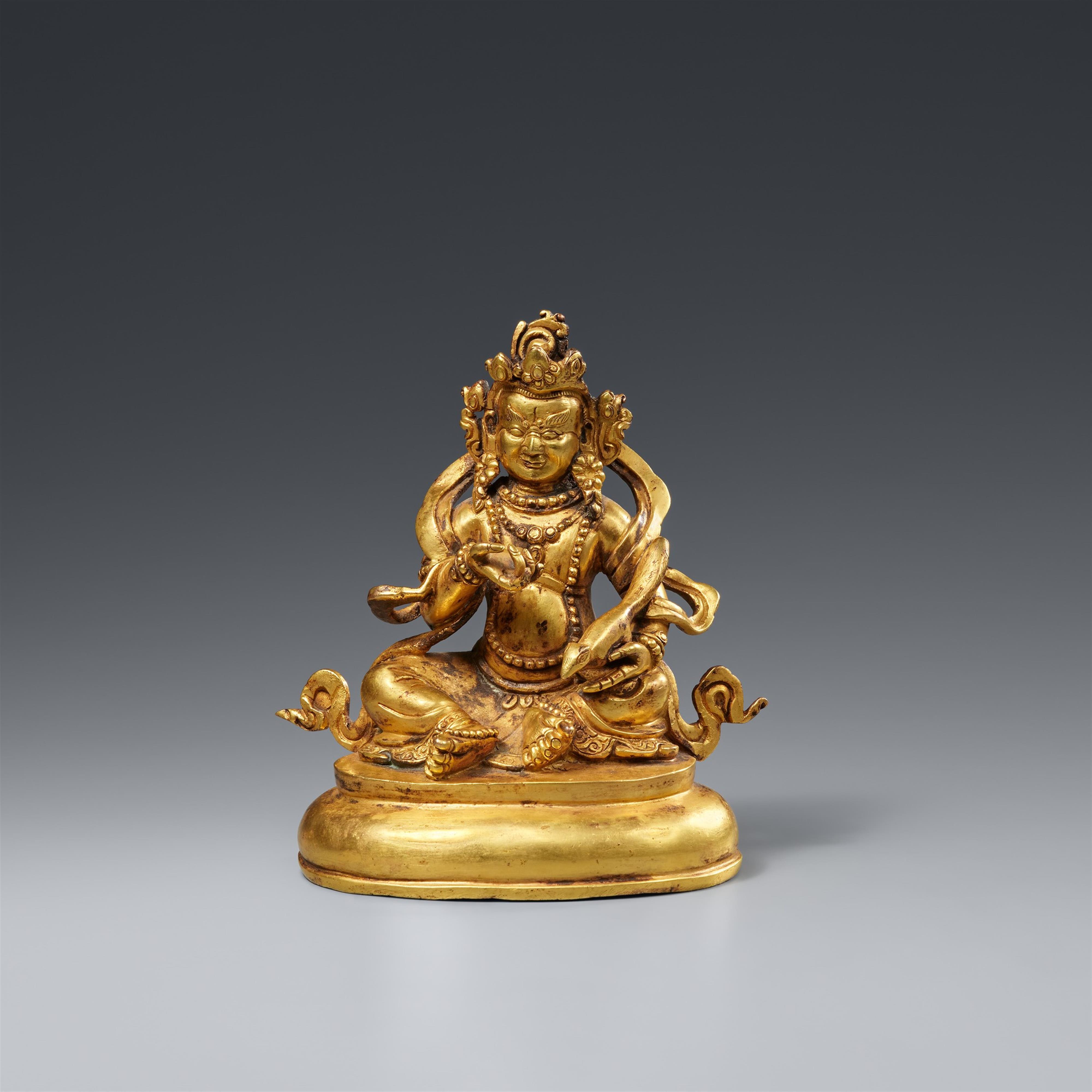 A fire-gilt bronze of Jambhala. 19th/20th century - image-1