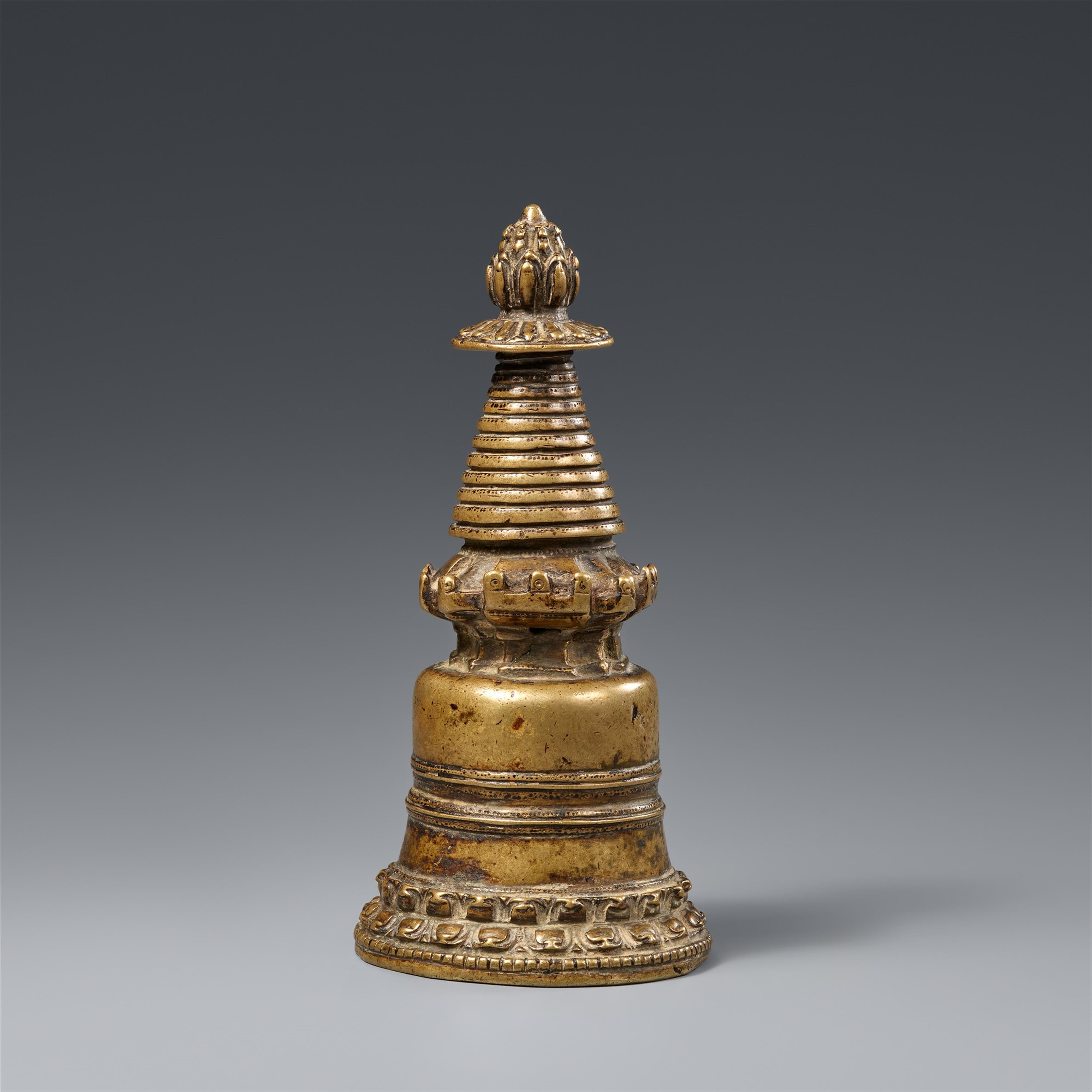 A Tibetan brass kadampa-stupa. 13th century - image-1