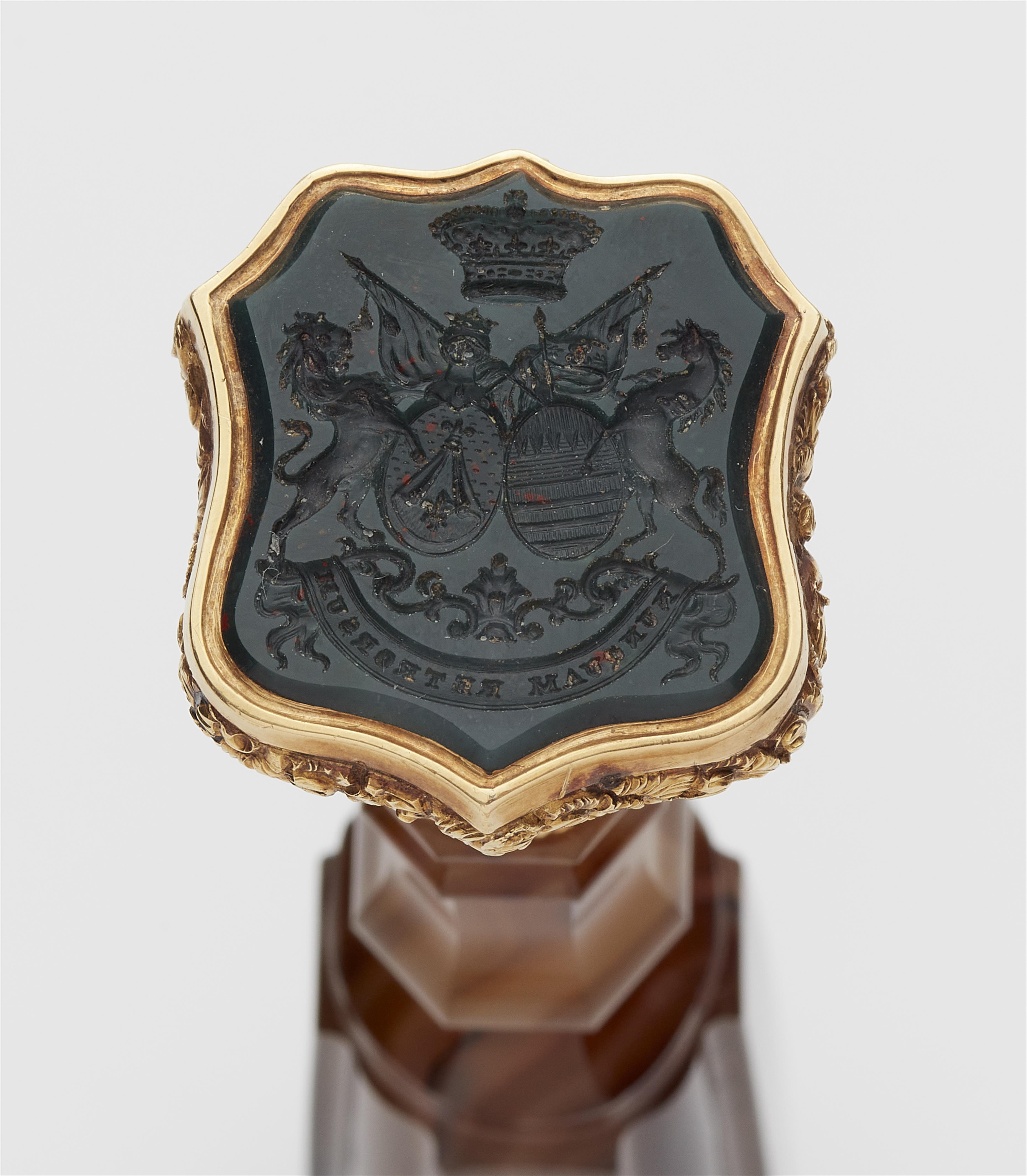 A gold and agate desk seal with princely alliance coat of arms. - image-2