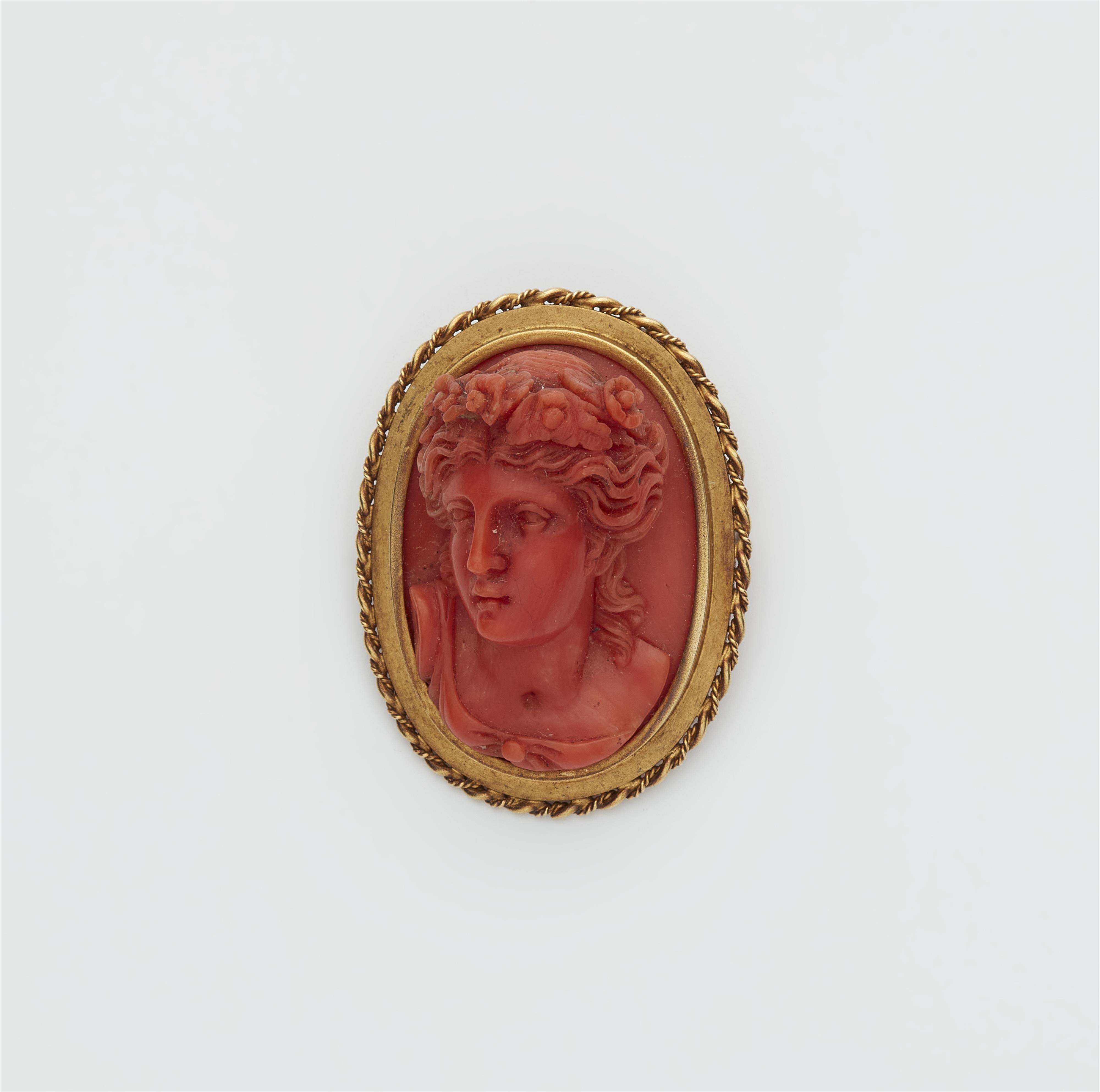 A 14k gold and Mediterranean red coral cameo brooch. - image-1