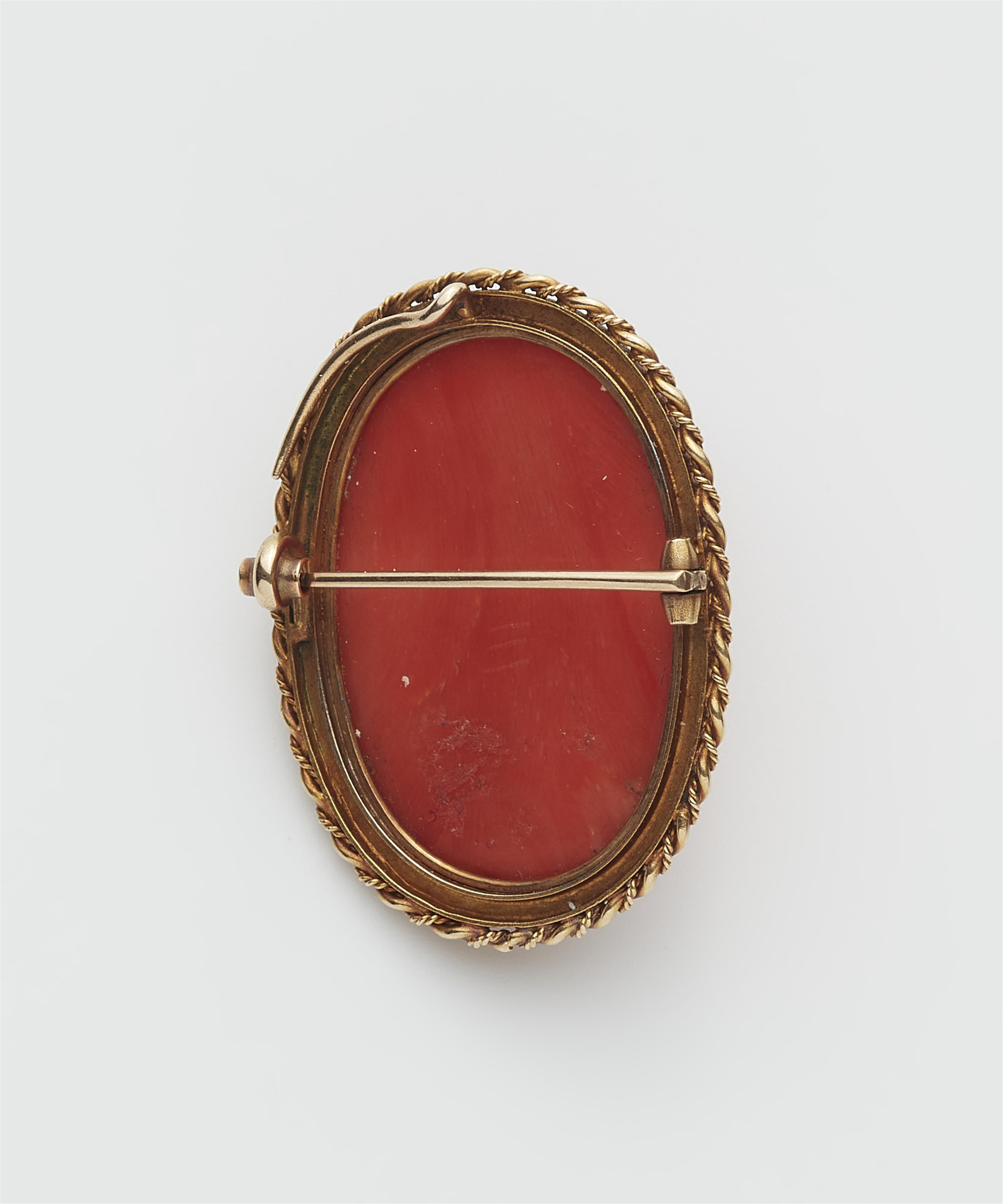 A 14k gold and Mediterranean red coral cameo brooch. - image-2