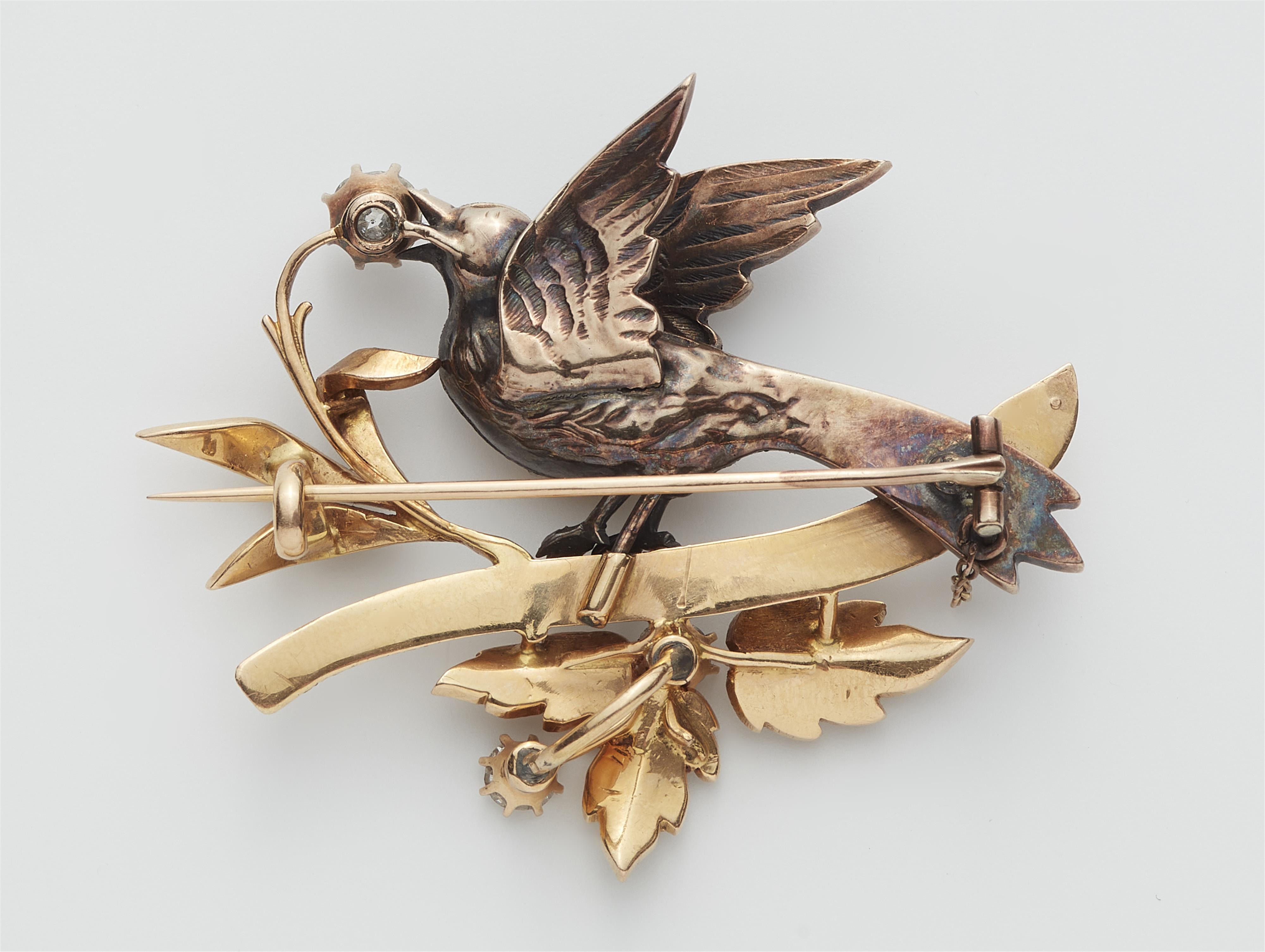 A silver 14k gold diamond and seed pearl brooch depicting a bird on a twig. - image-2