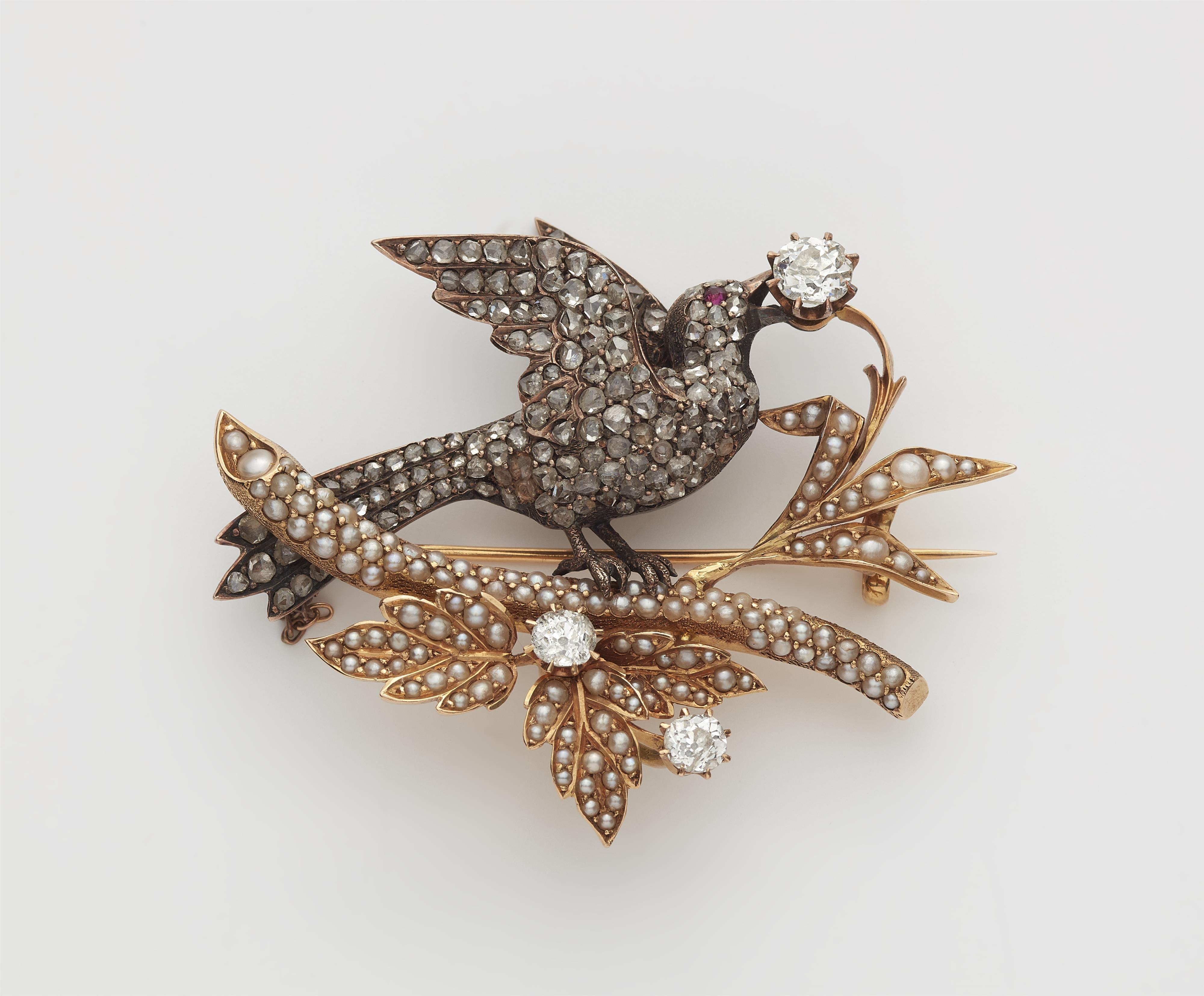 A silver 14k gold diamond and seed pearl brooch depicting a bird on a twig. - image-1