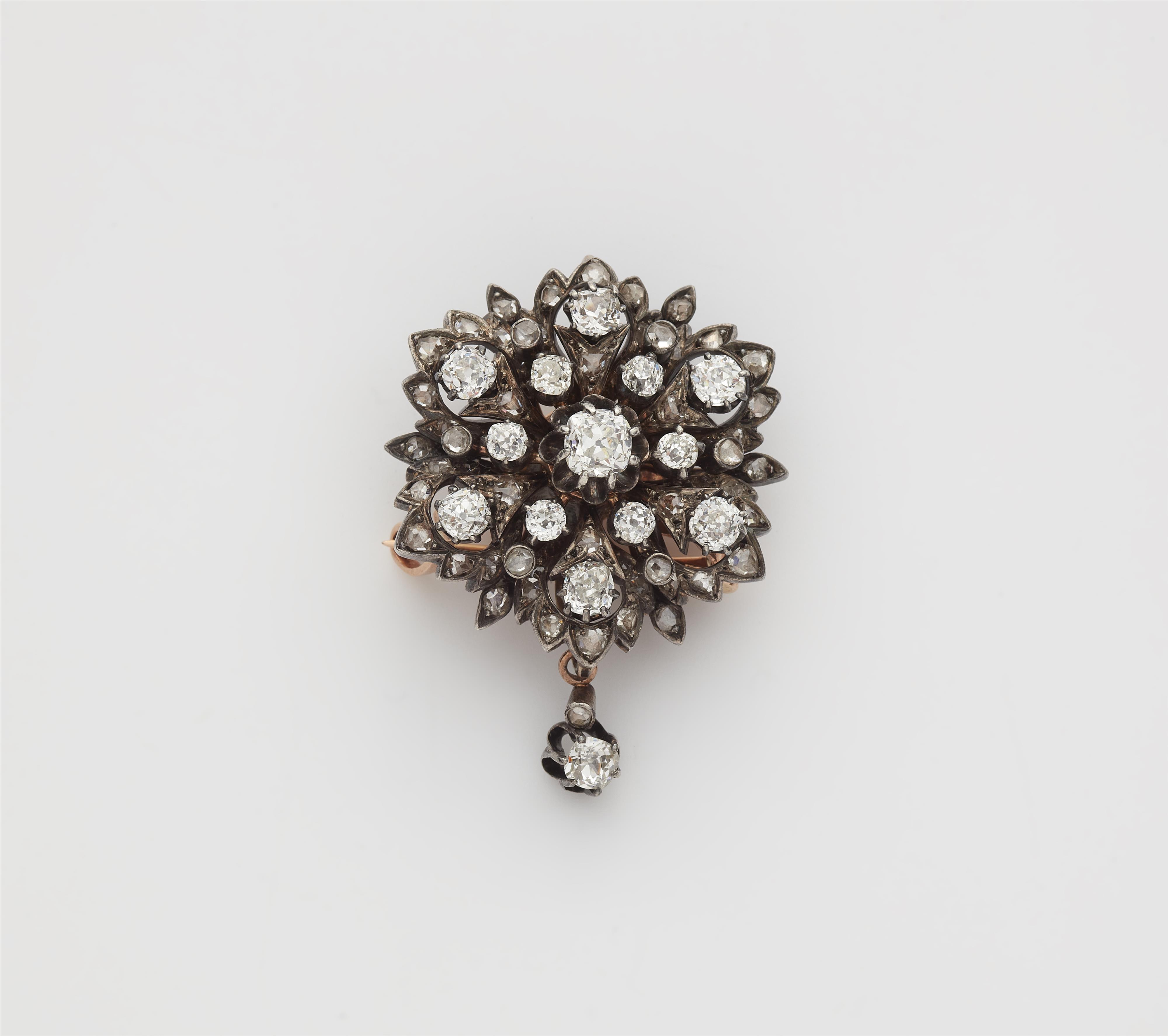 A silver 14k red gold diamond rosette brooch. - image-1