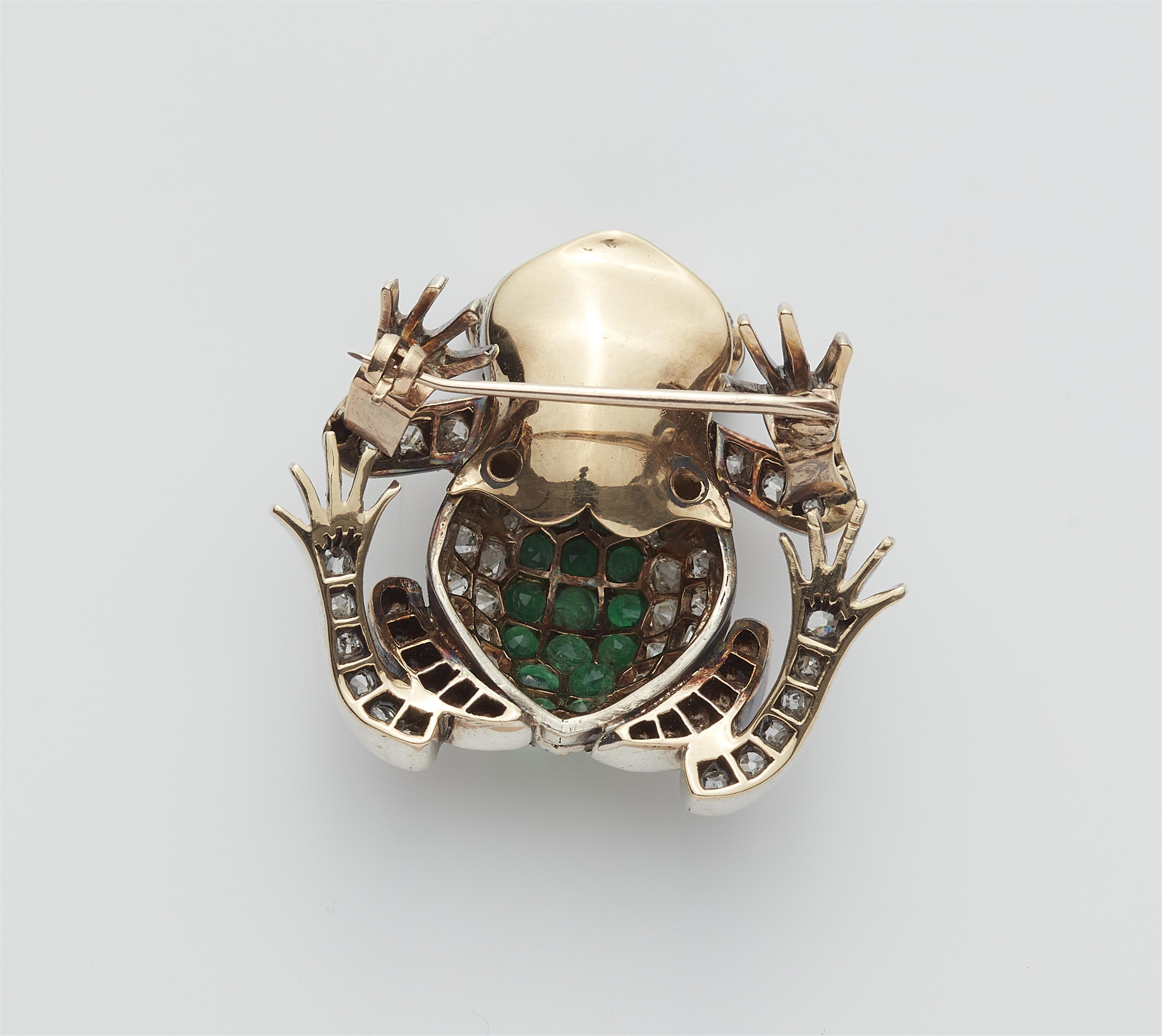 A silver 18k gold emerald and cushion cut diamond frog brooch. - image-2