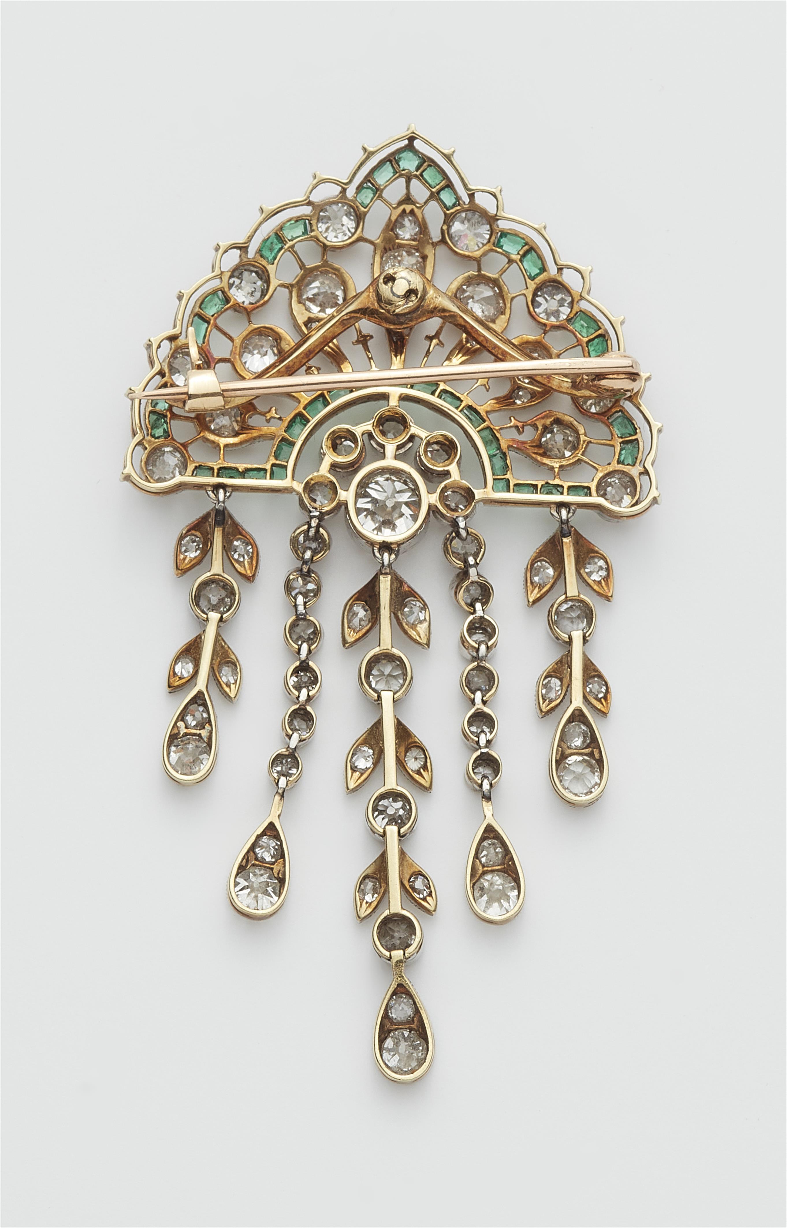 An Edwardian platinum 14k gold diamond and emerald waterfall brooch. - image-3