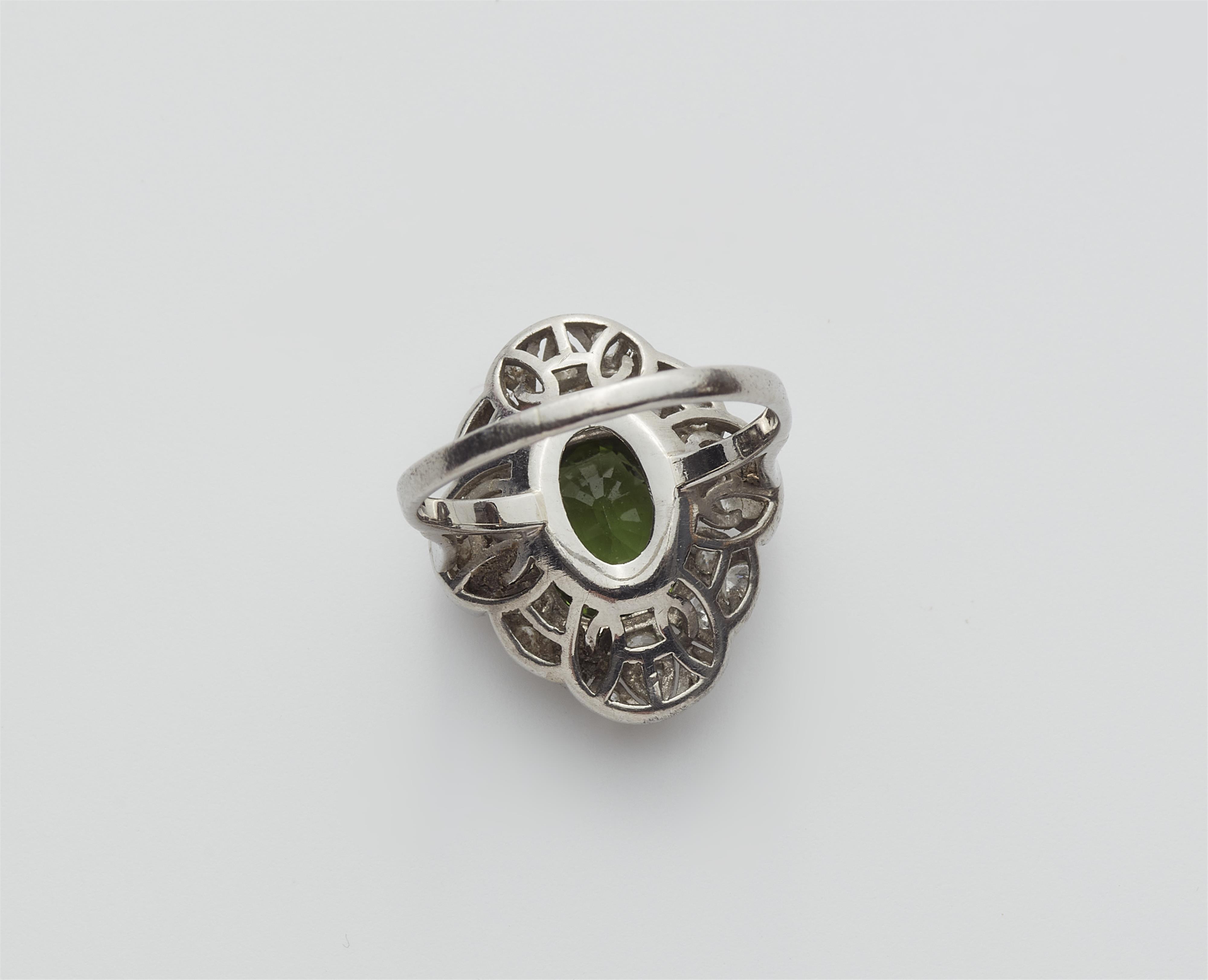 An 18k white gold diamond and green tourmaline Art Déco ring. - image-2
