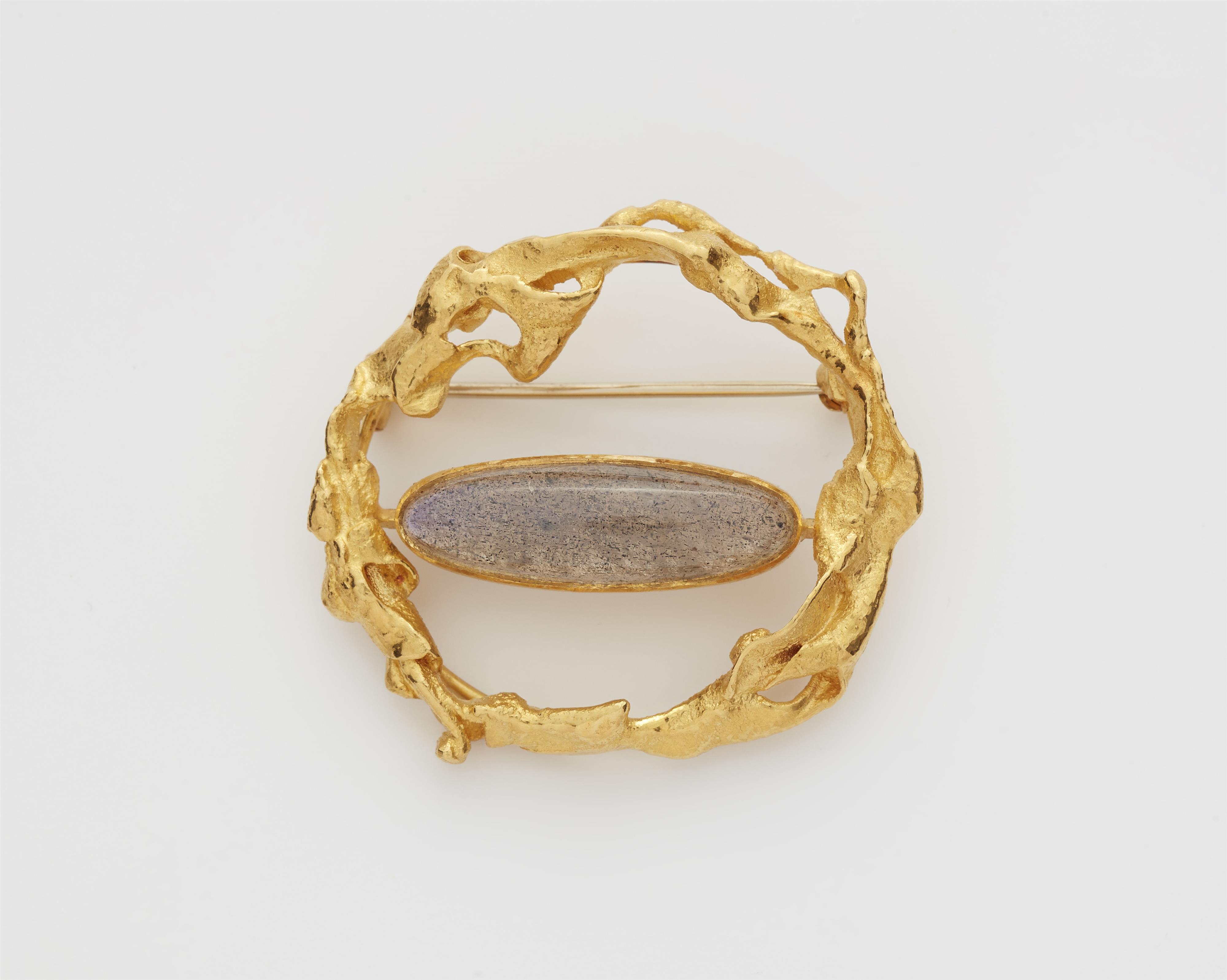 A German 20k gold and labradorite cabochon hoop brooch. - image-1