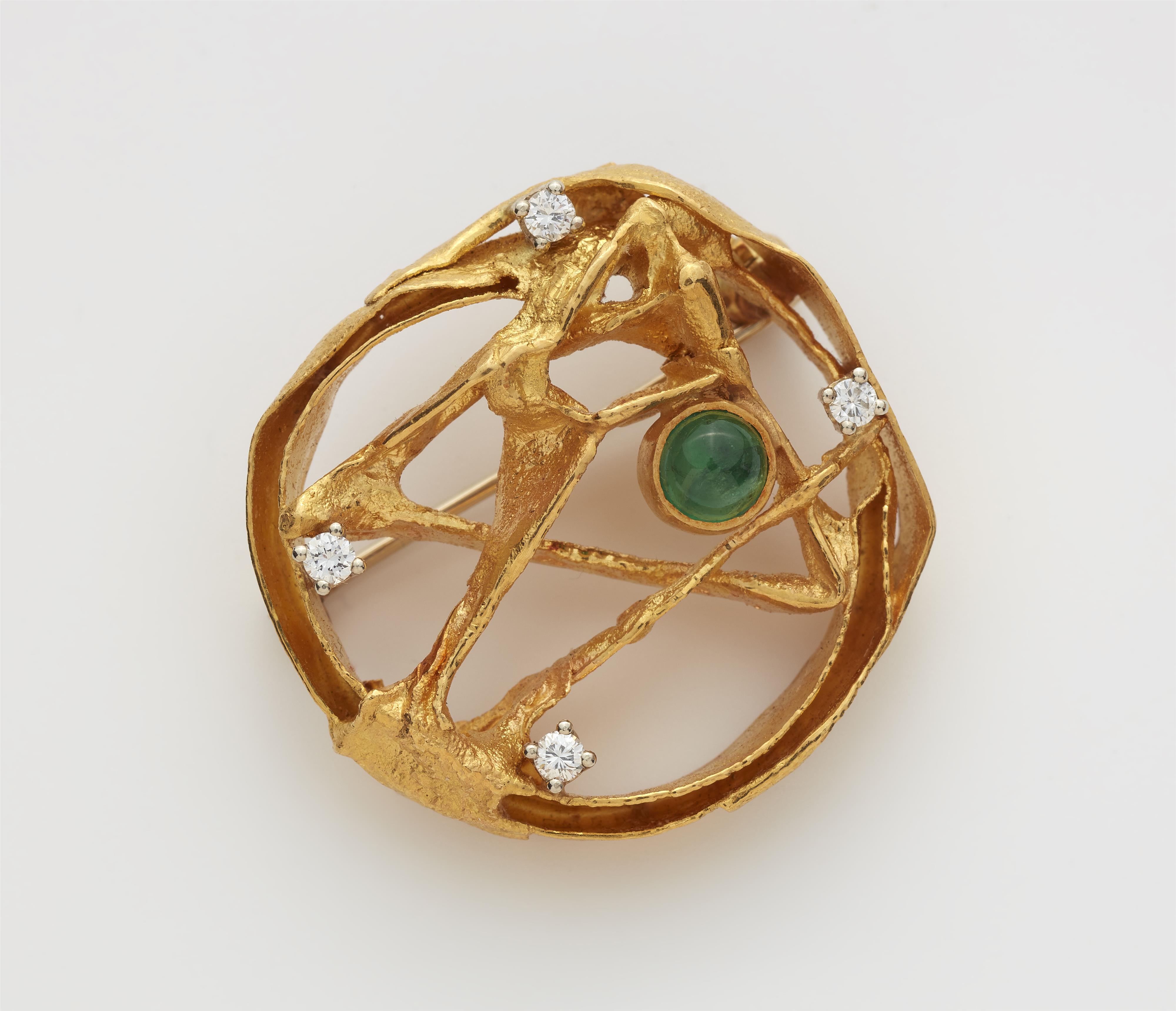 A German 20k gold diamond and emerald cabochon brooch. - image-2