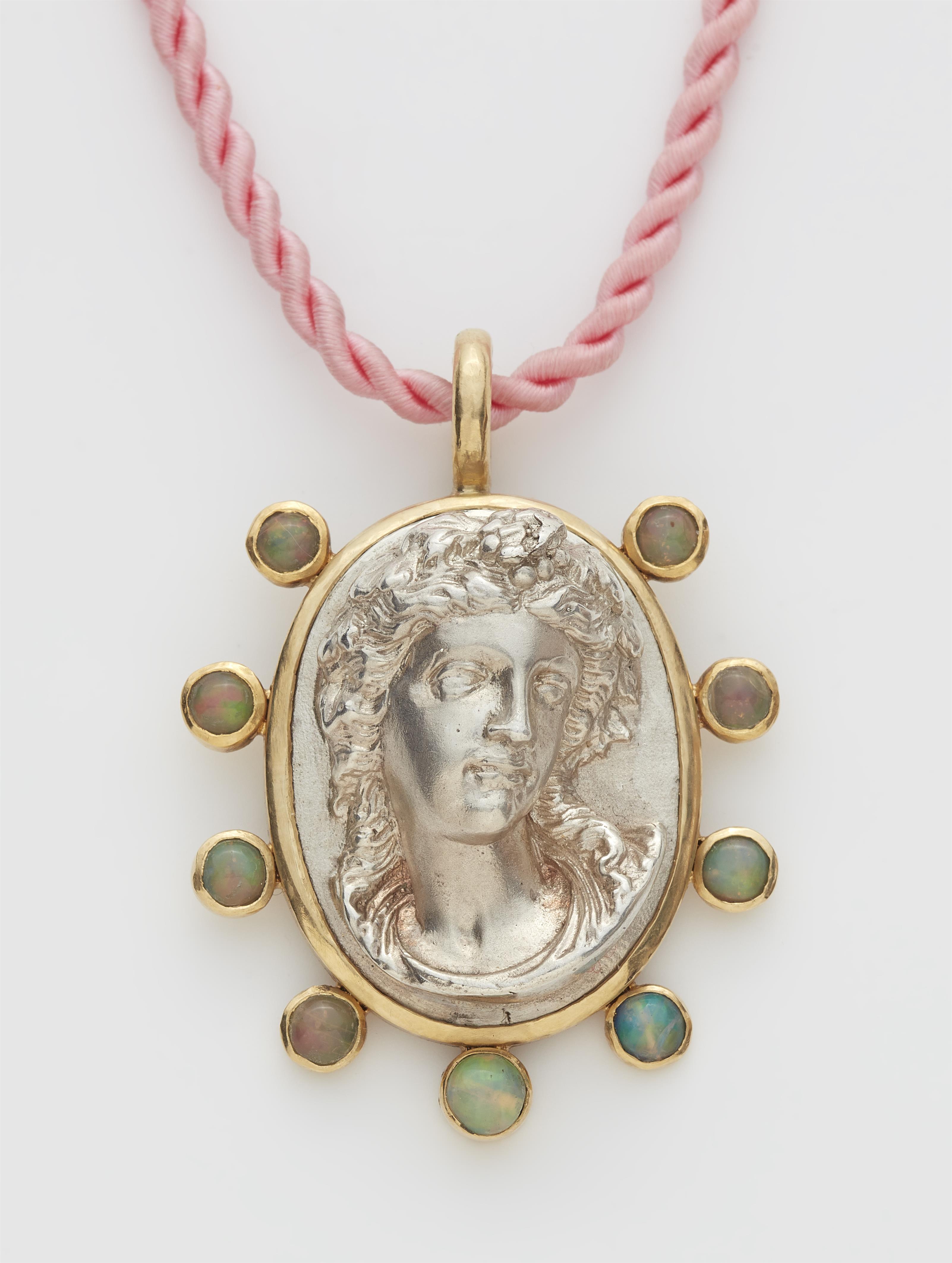 A German one of a kind 18k gold and opal pendant with a silver cast Bacchus head after a 19th century cameo. - image-1