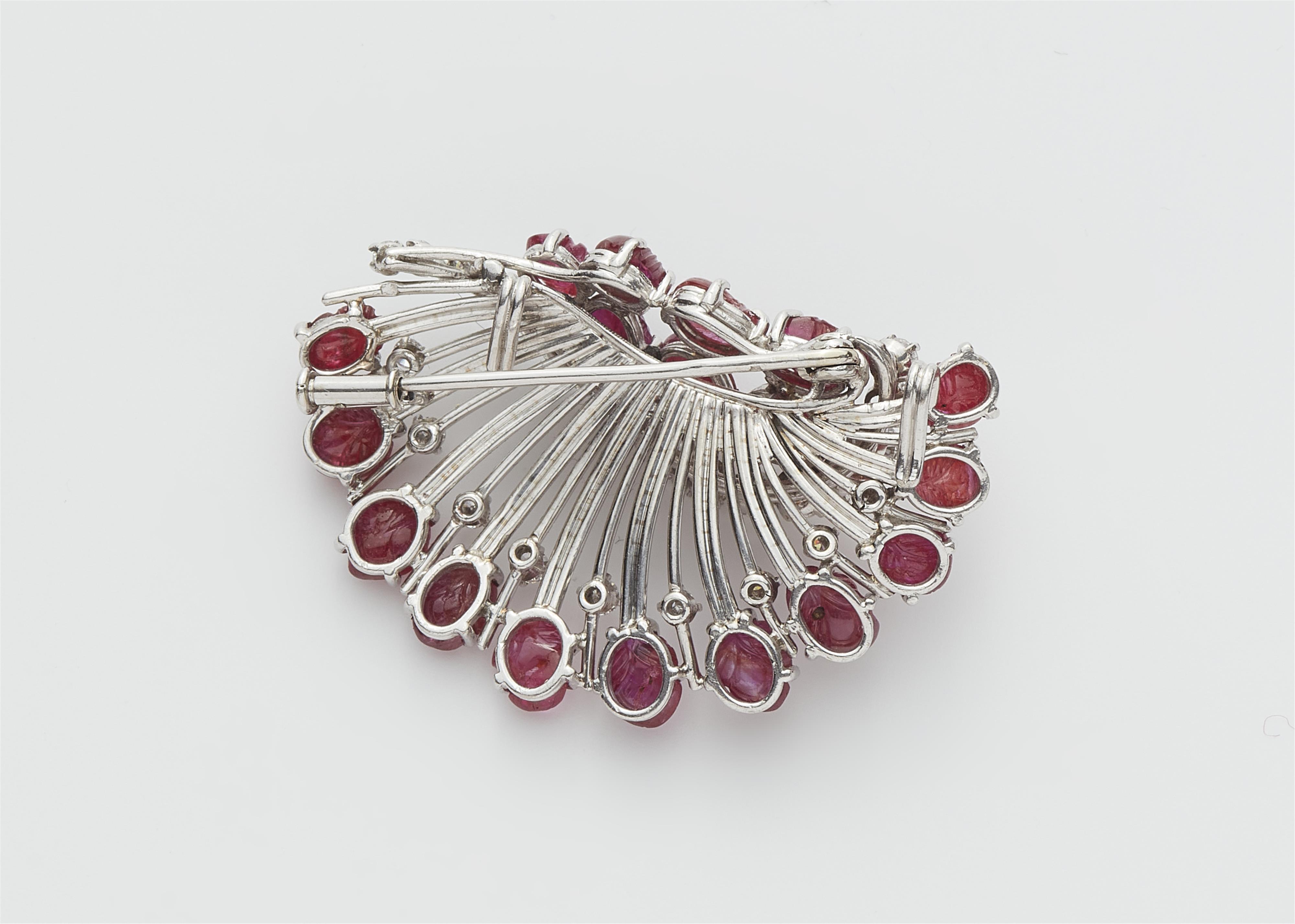 A French 18k white gold diamond and carved ruby Retro style brooch. - image-2