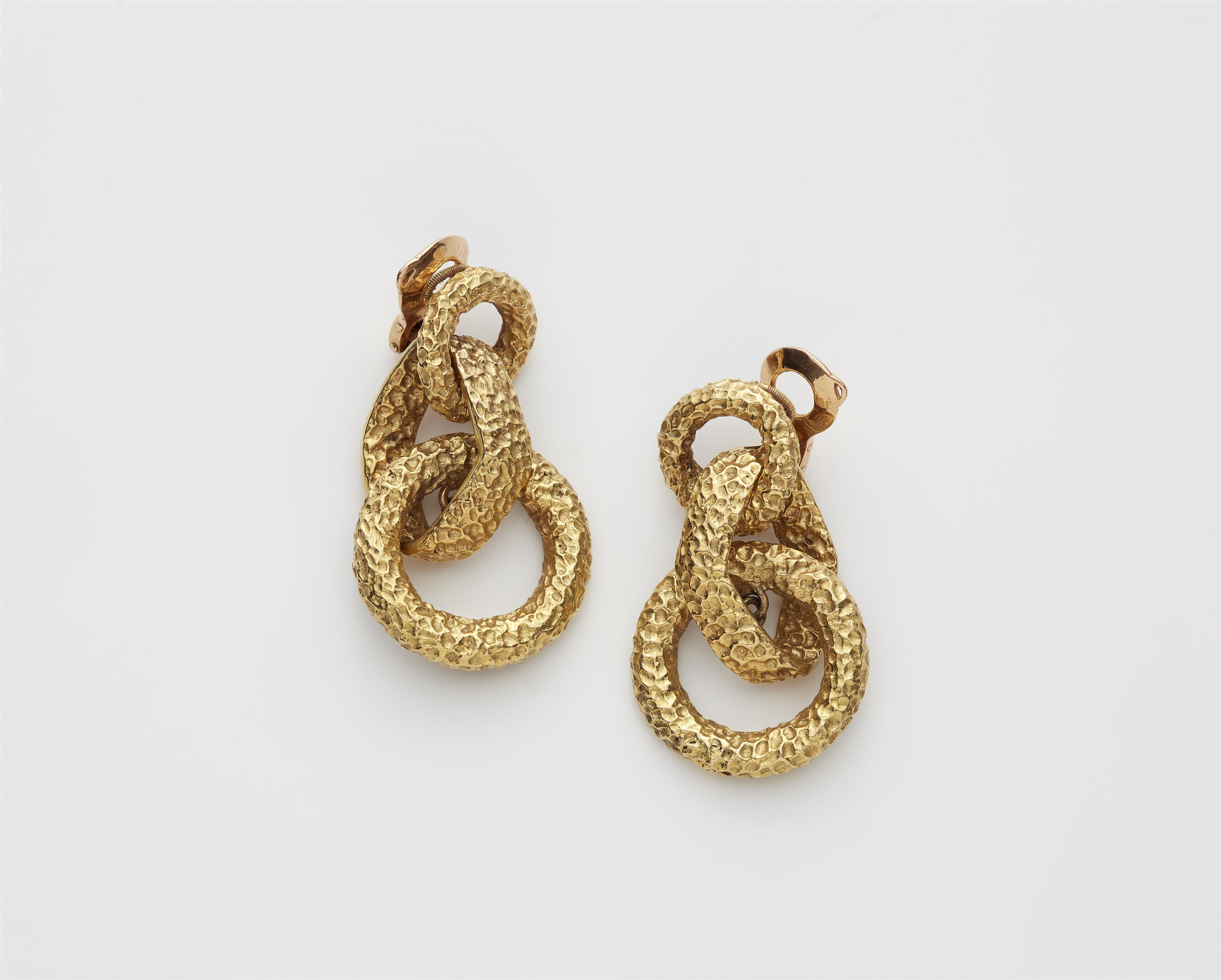 A pair of French structured 18kt gold hoop earrings. - image-1