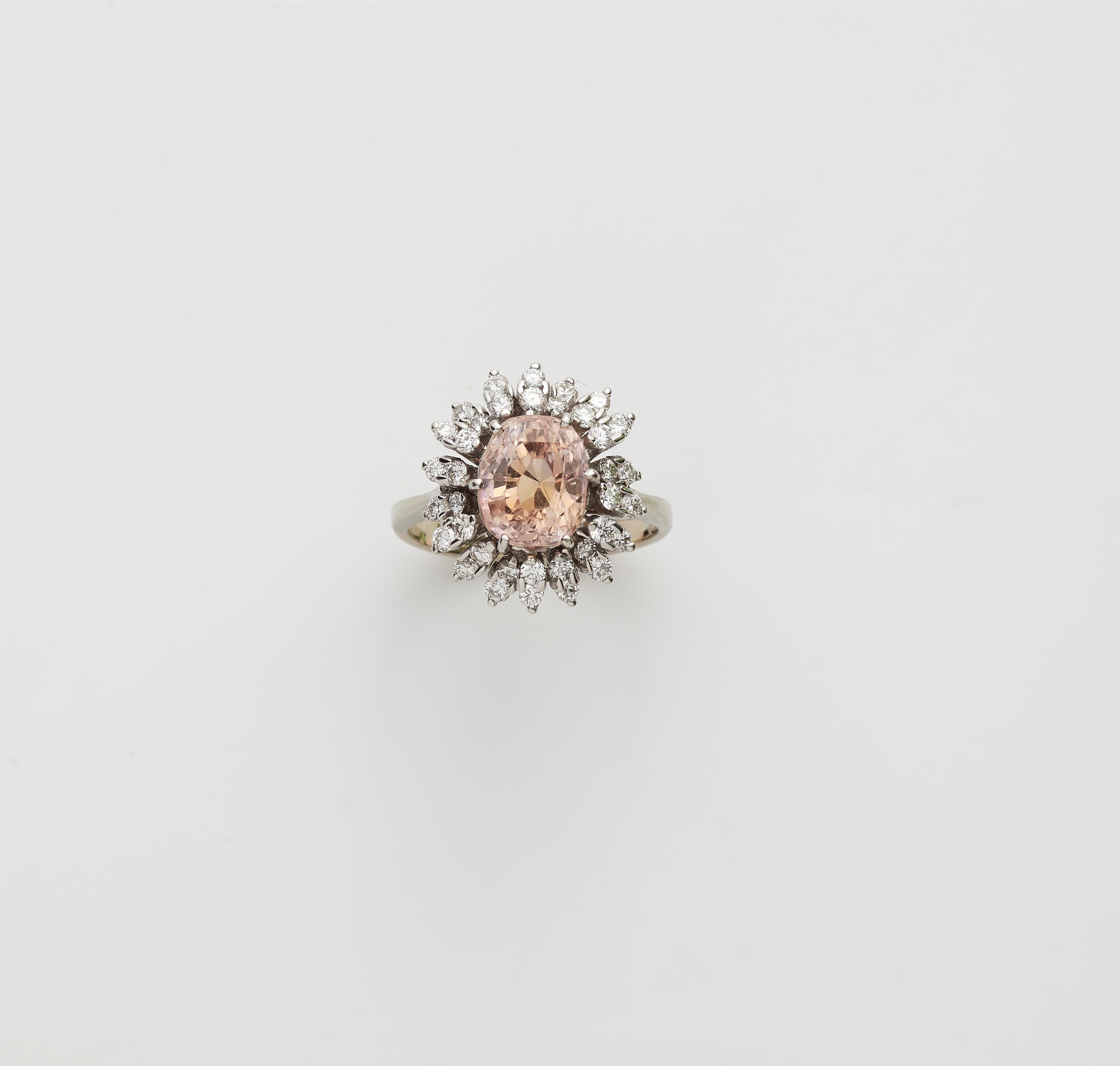 An 18k white gold Padparadscha sapphire ring. - image-2