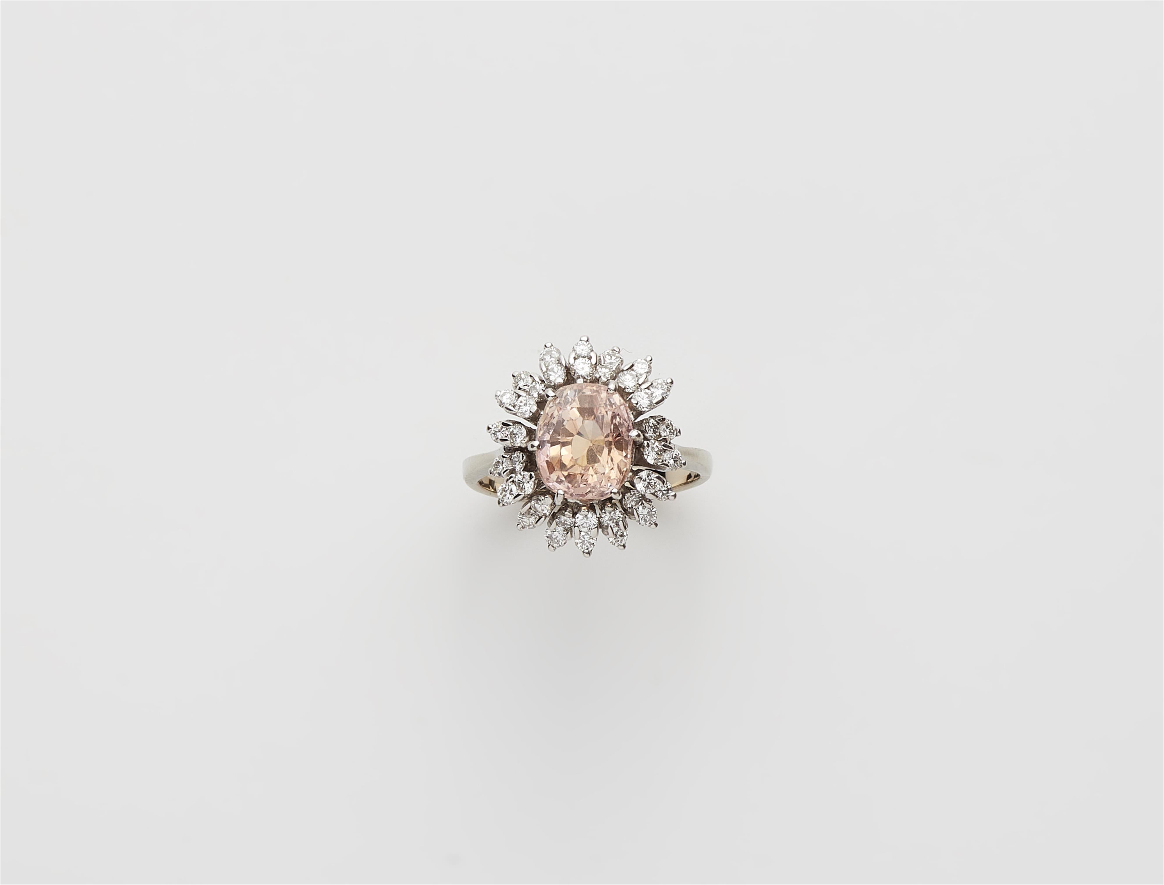 An 18k white gold Padparadscha sapphire ring. - image-1